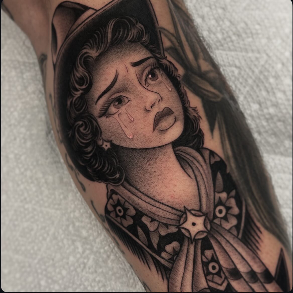 Woman crying American traditional tattoo on the forearm by Pat Moser