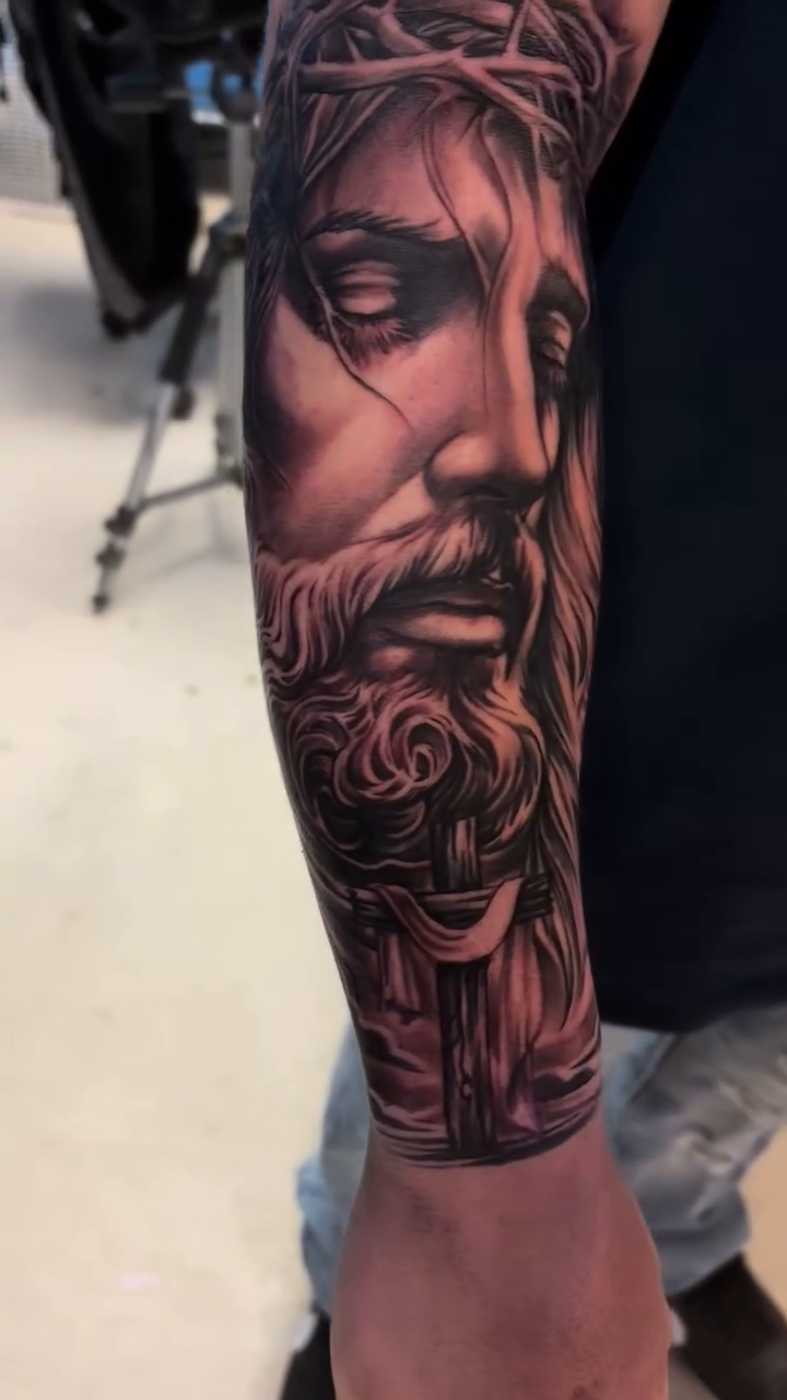 Jesus Christ portrait with rose realism tattoo by Anthony Coleman, Midland, Texas