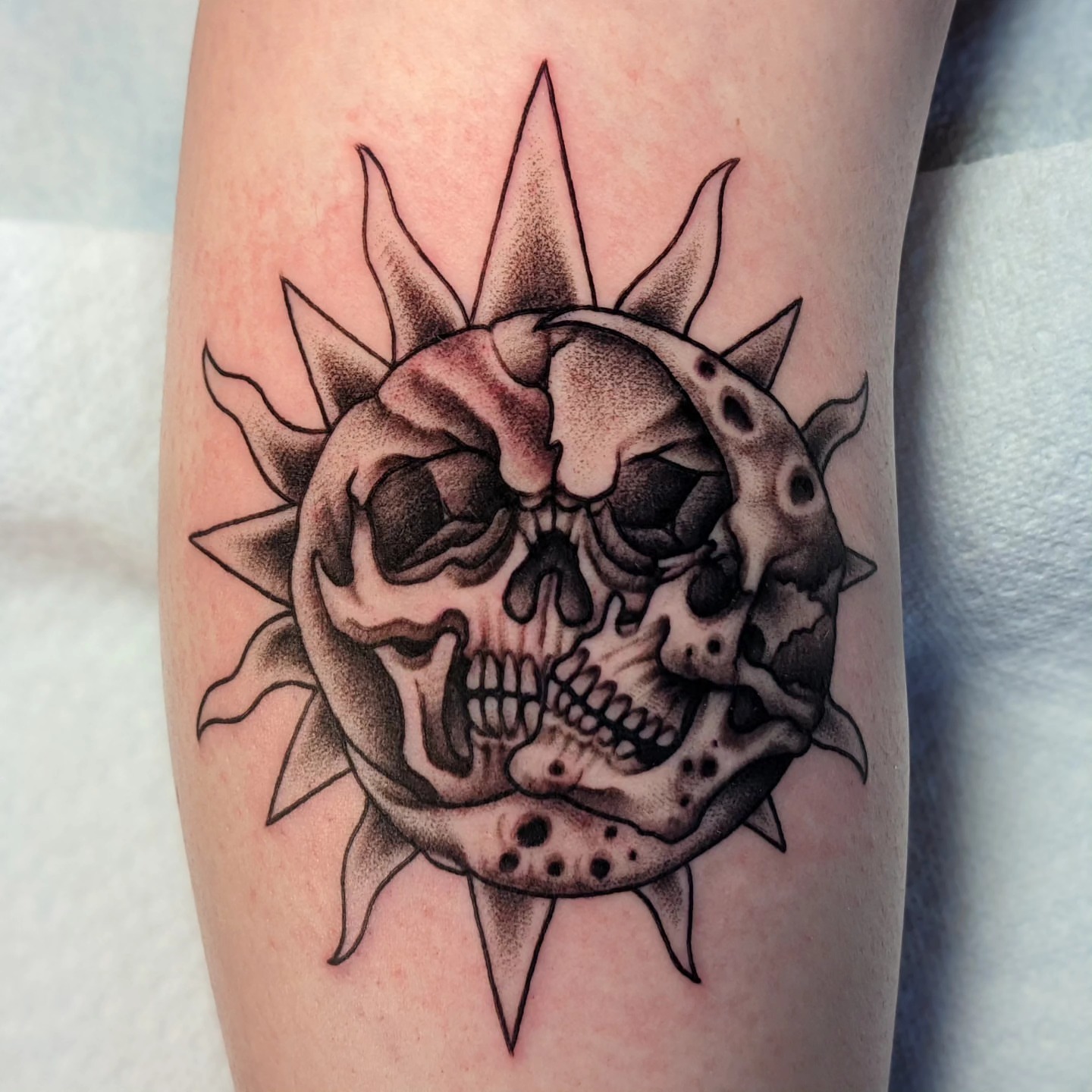 Skull dotwork tattoo on the forearm by Matt Simmonds