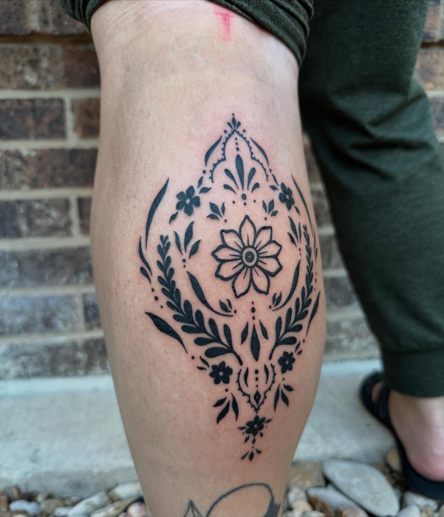 Floral mandala ornamental tattoo on the calf by Emily ๐น