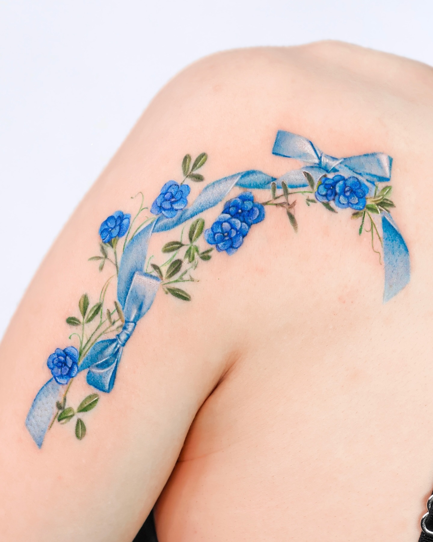 Tattoo by @xrou_tattoo — watercolor