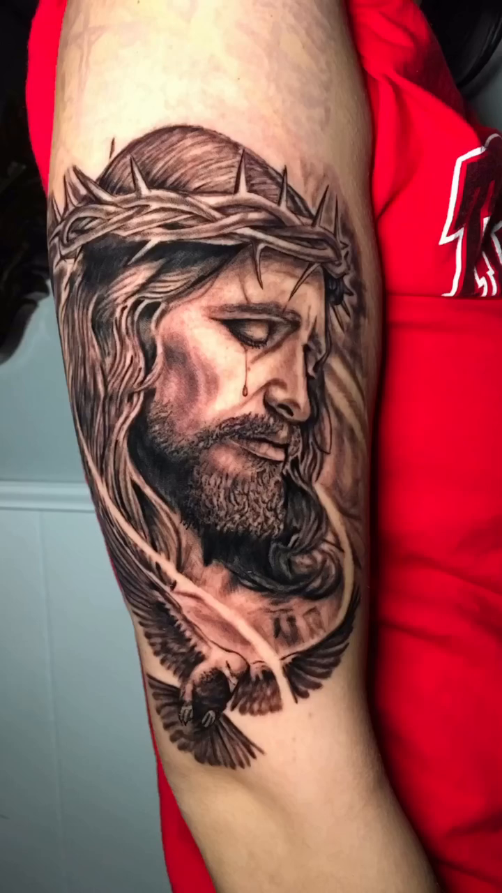 Jesus Christ portrait Chicano tattoo on the forearm by Joshua Shawn