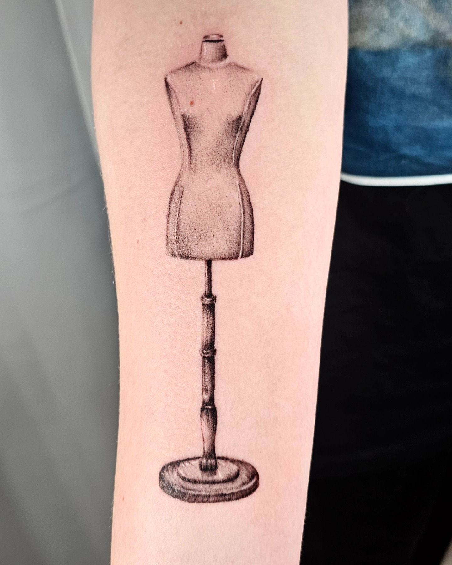 Mannequin dotwork tattoo on the forearm by Madelynne