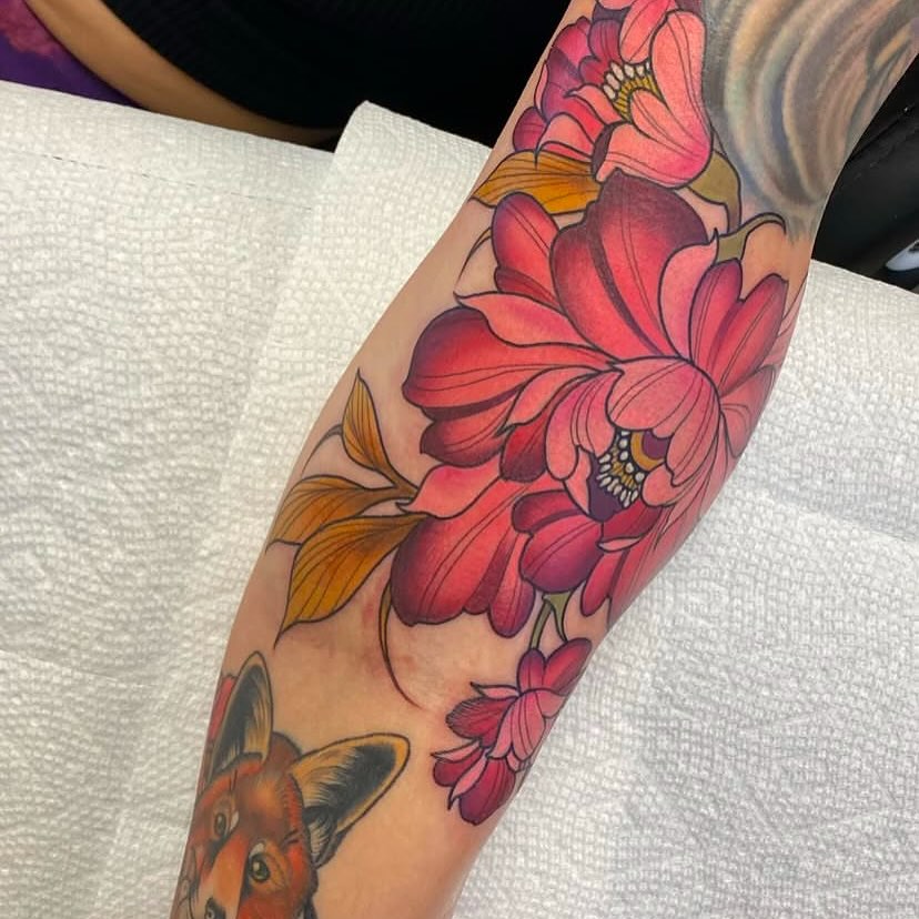 Flowers new school tattoo on the forearm by Connie Fiorino - Tattoo Artist