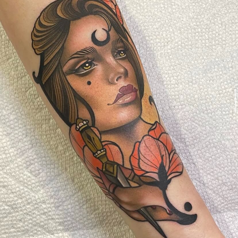 Woman with sword and flower American traditional tattoo on the forearm by Connie Fiorino - Tattoo Artist