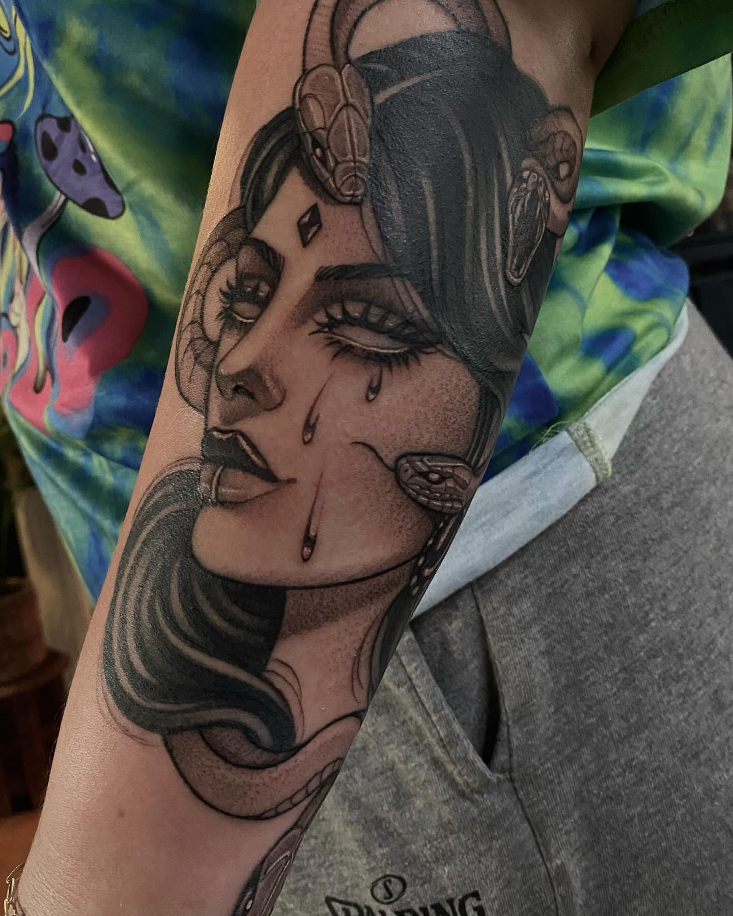 Woman with snake realism tattoo on the forearm by 𝔗𝔞𝔶𝔩𝔬𝔯 𝔈𝔩𝔦𝔷𝔞𝔟𝔢𝔱𝔥, Tulsa, Oklahoma
