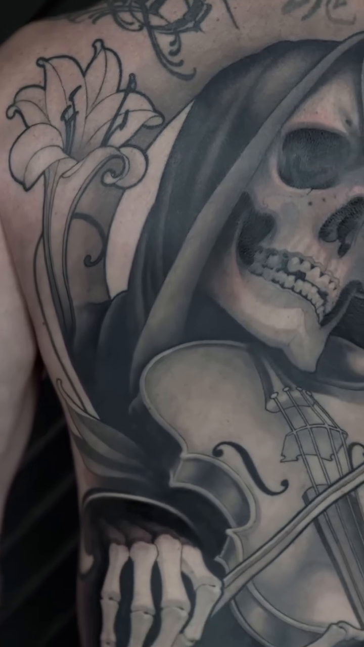 Tattoo by @michaeljtattoos — dark_realism, black_and_grey