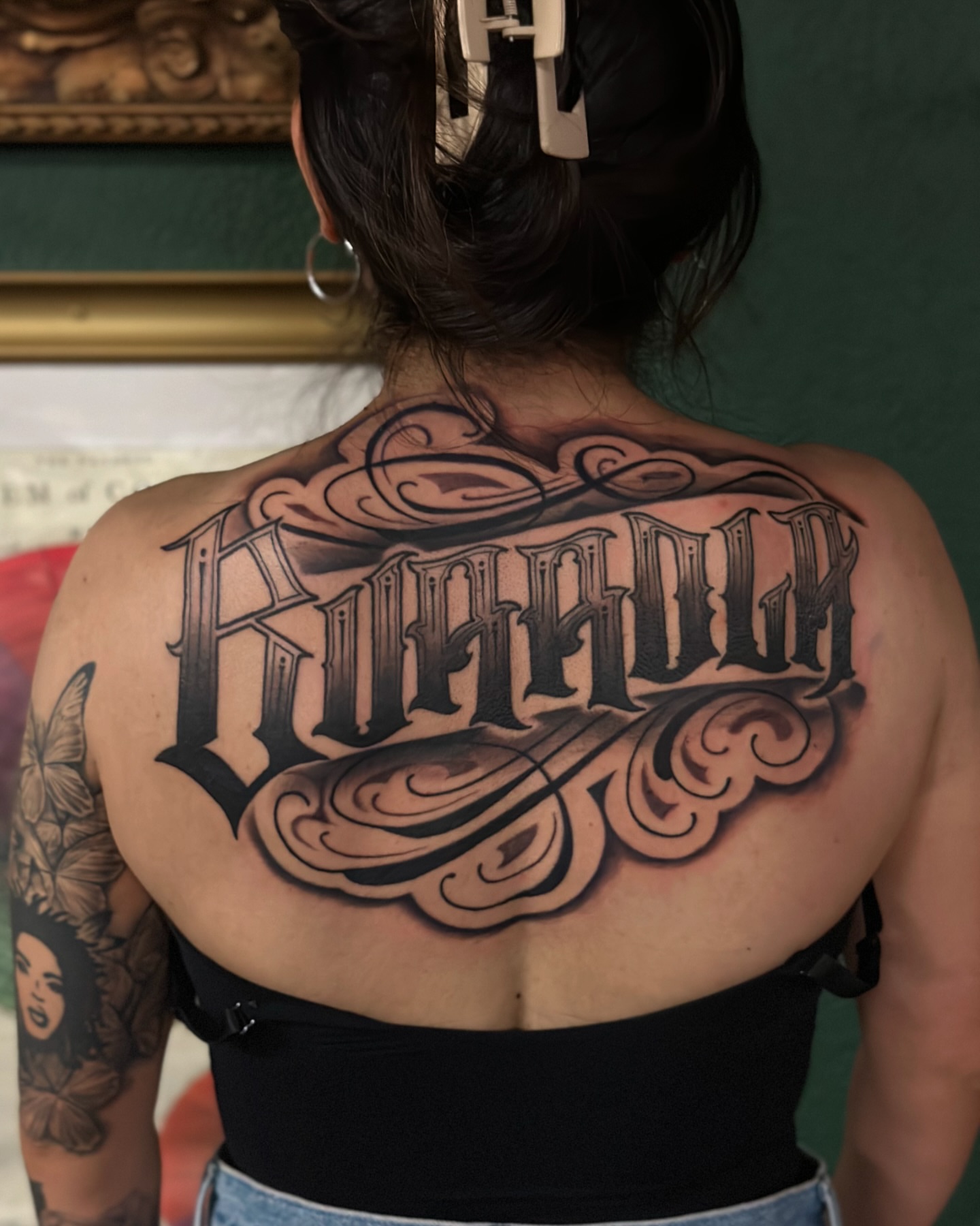 Script lettering lettering script tattoo on the back by Calvin Maryland 🇵🇹