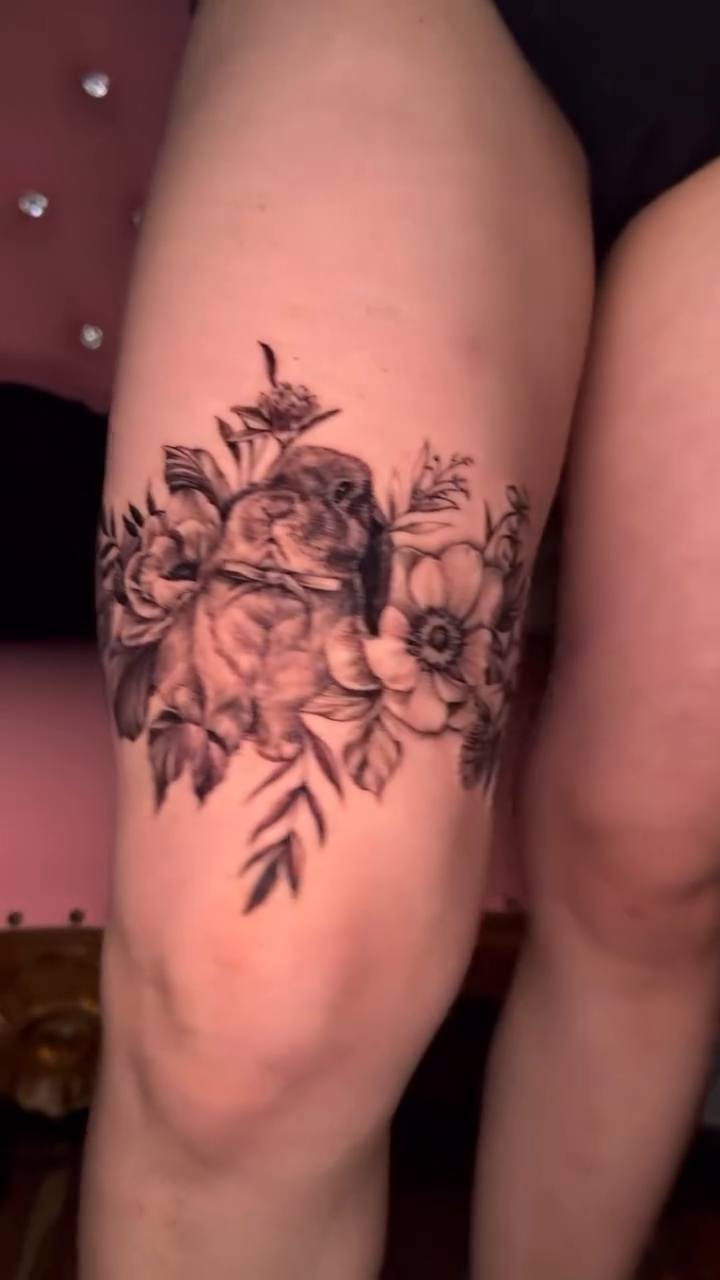 Floral arrangement with owl realism tattoo by Martina Zago