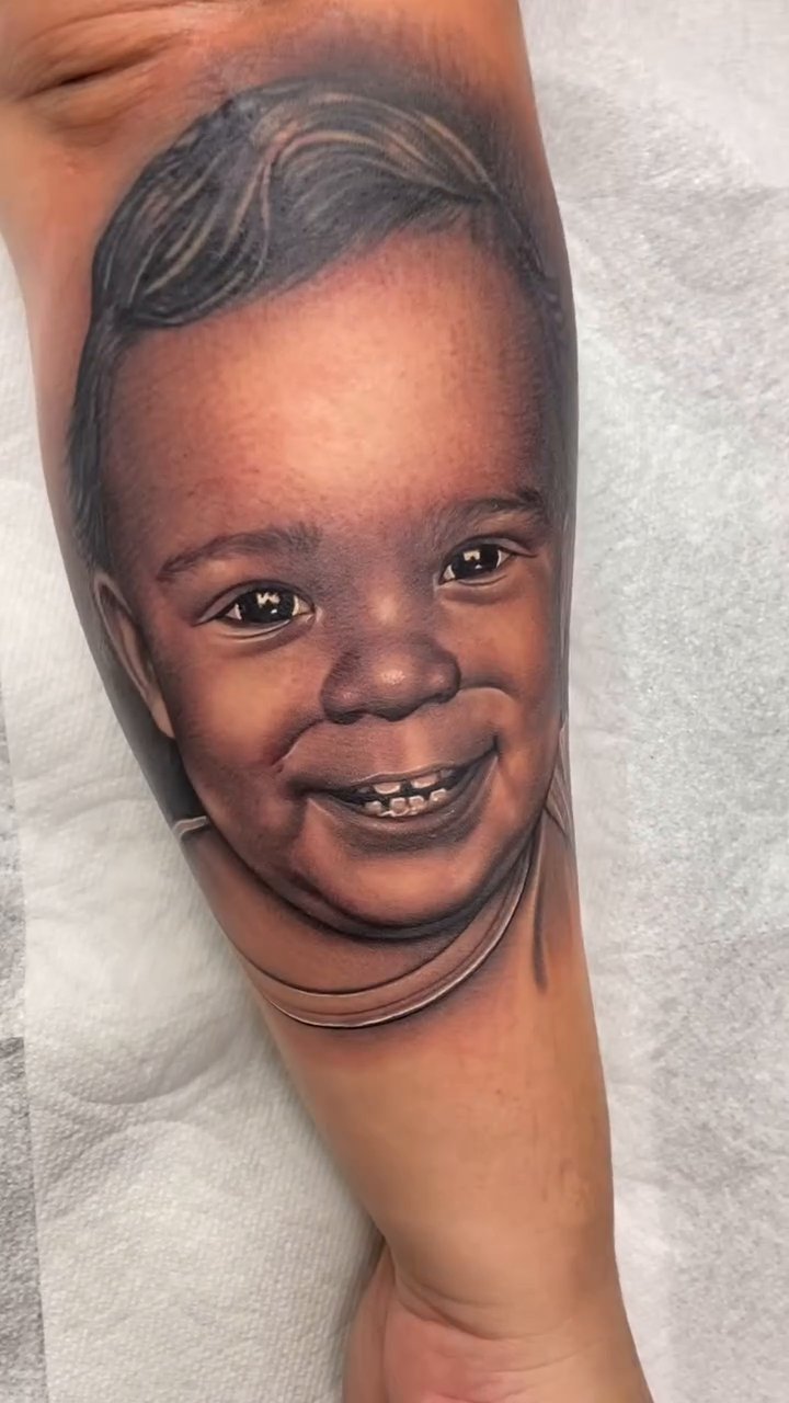 Baby portrait realism tattoo by Joshua ramirez, Montebello, California
