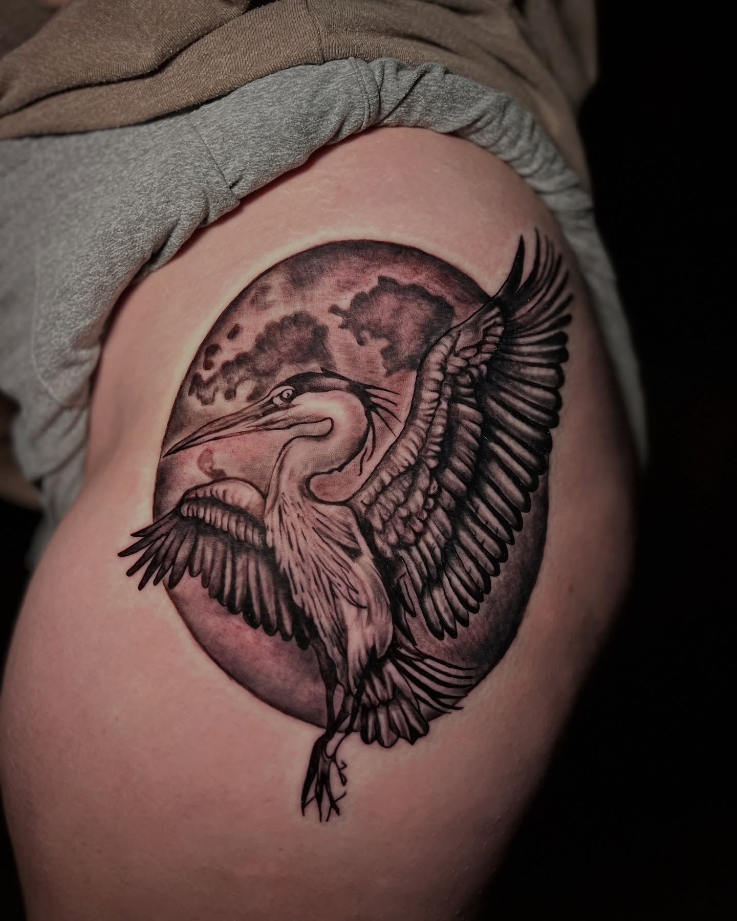 Heron and moon realism tattoo on the thigh by Lucky Valenzuela, Lakewood, Colorado
