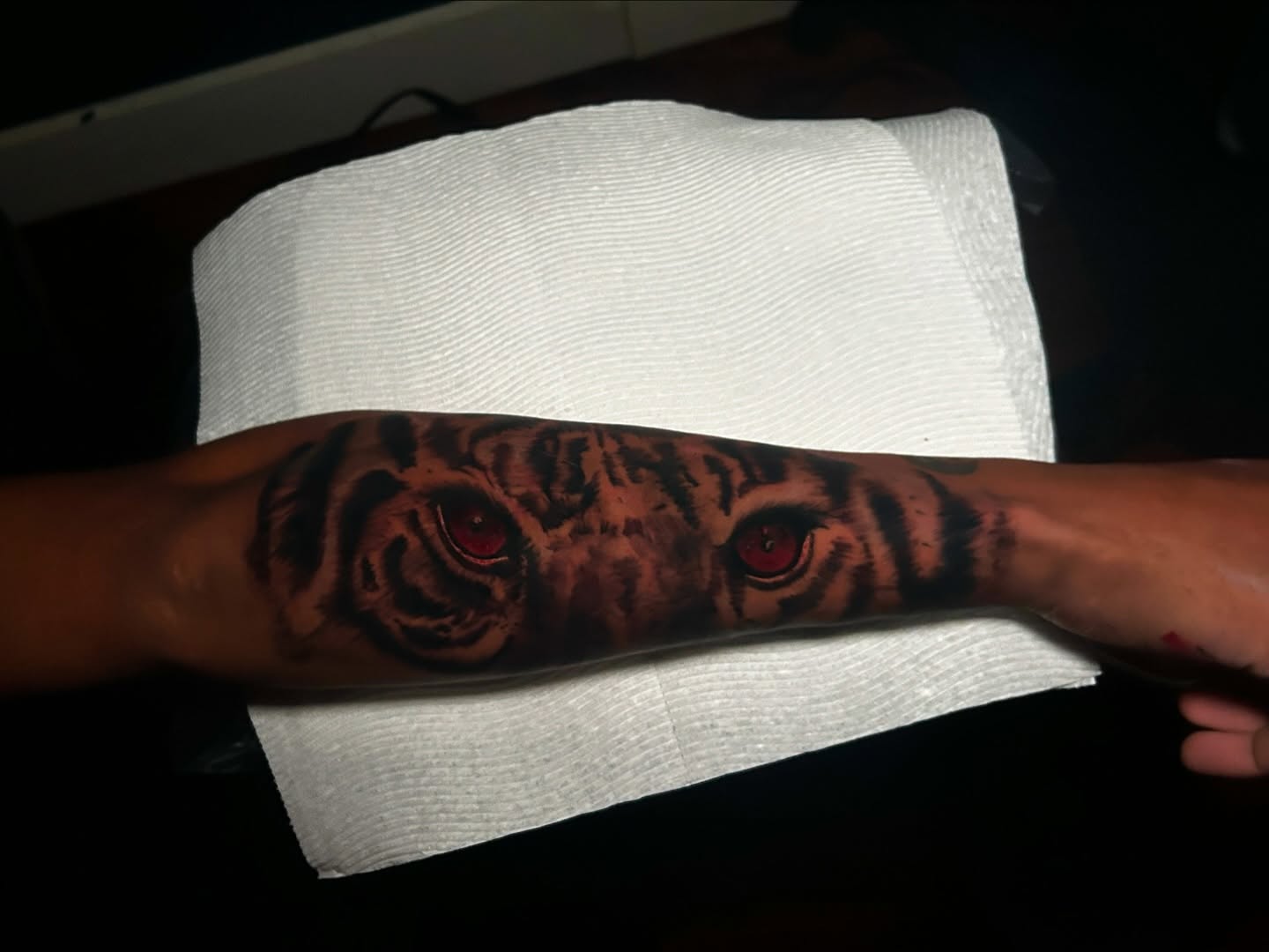 Tiger eyes realism tattoo on the forearm by ๐AK