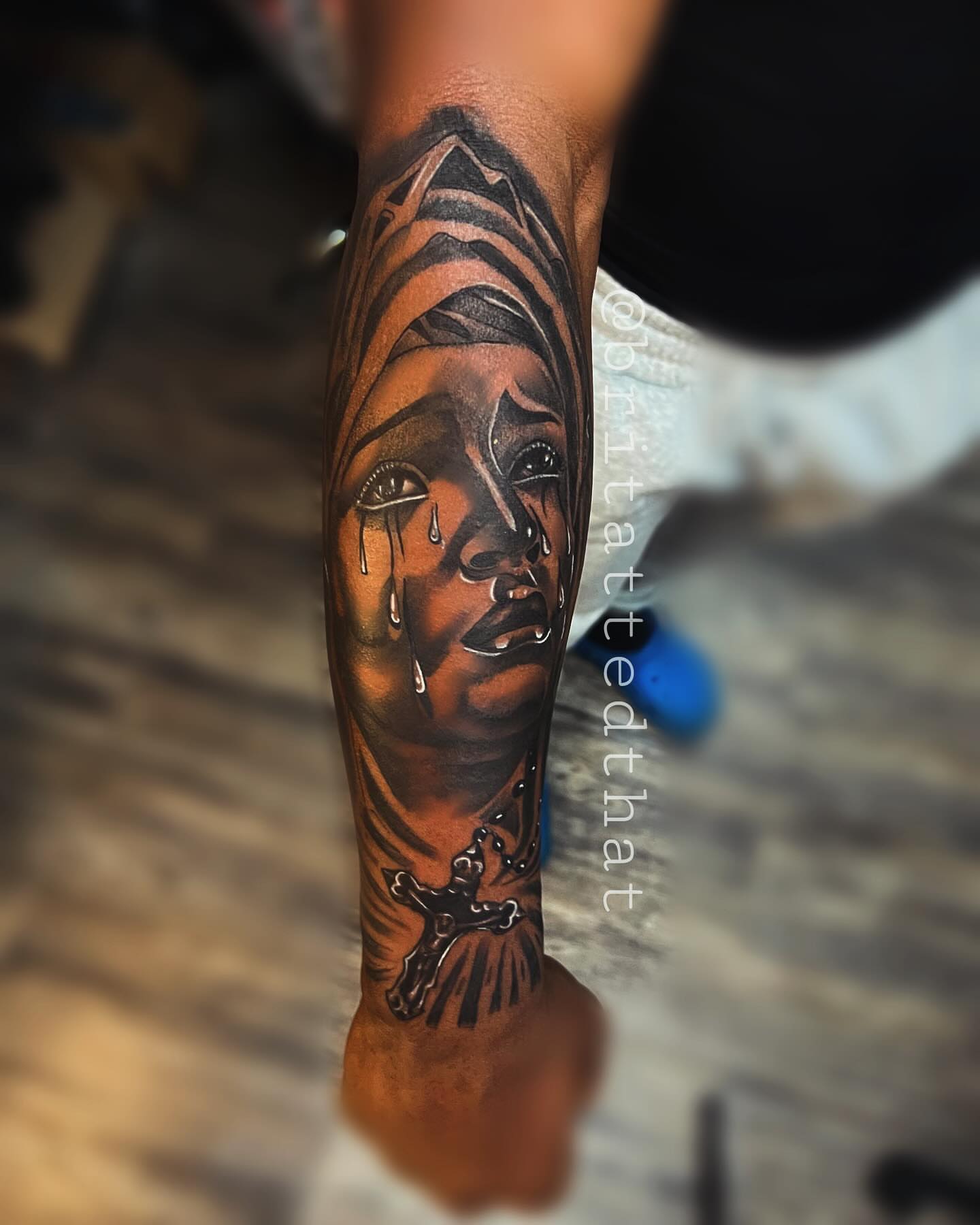 Religious figure realism tattoo on the forearm by Bri Tatted That