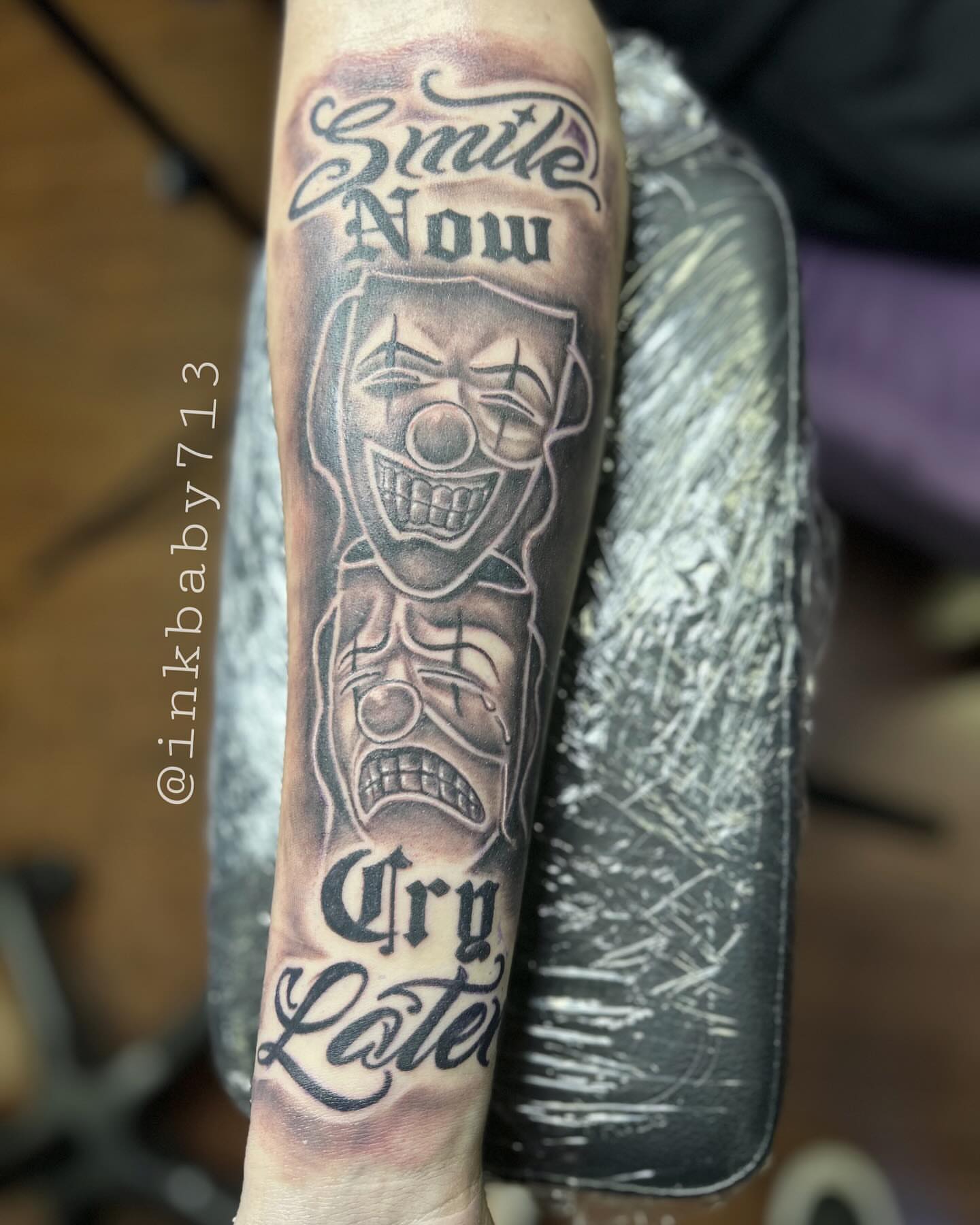 Clown black and grey tattoo on the forearm by Ayanna Luna