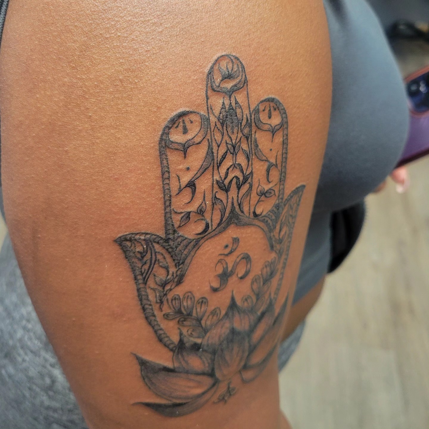 Hamsa hand black and grey tattoo on the forearm by LolaCat🐉