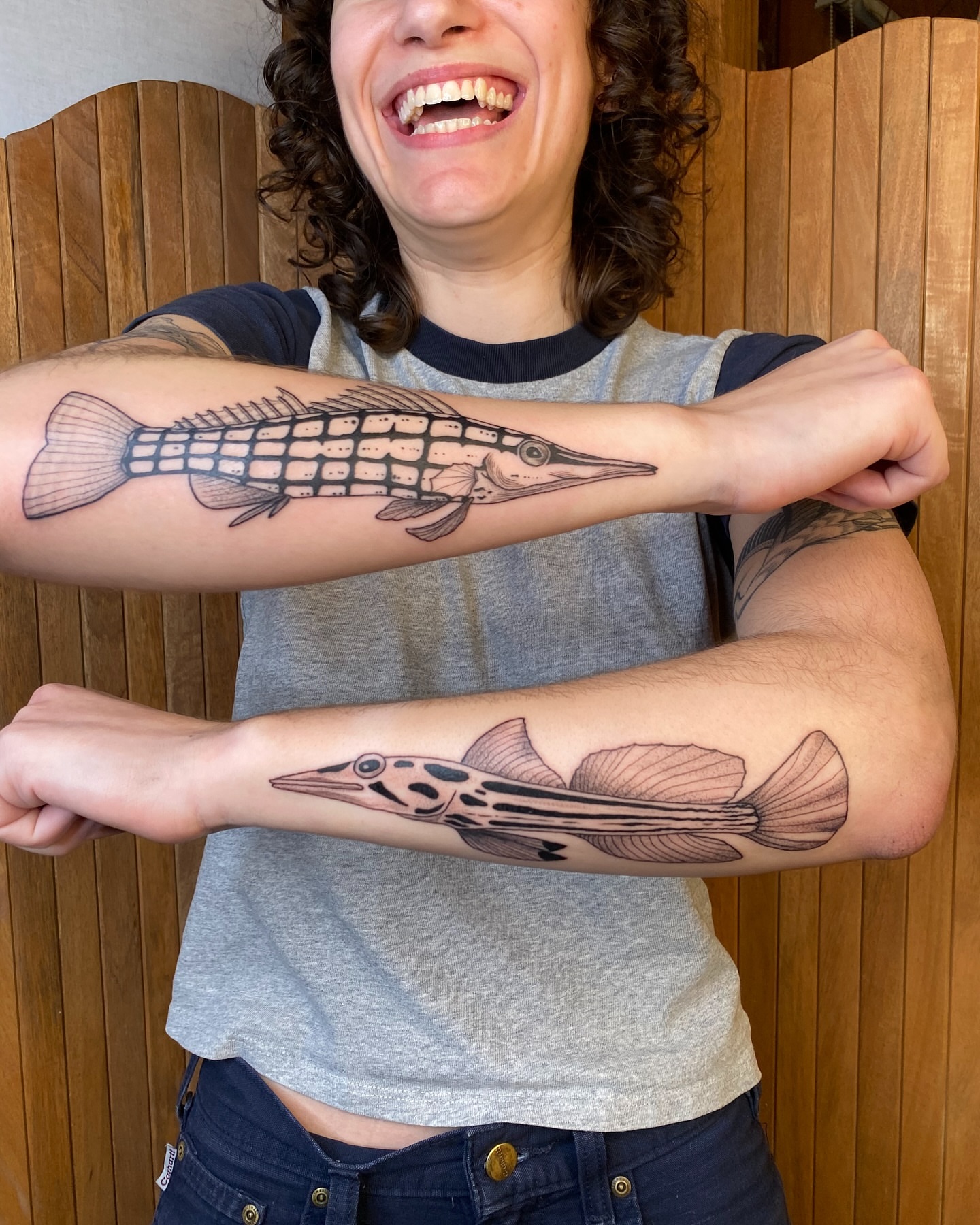 Fish black and grey tattoo on the forearm by Avery Kane