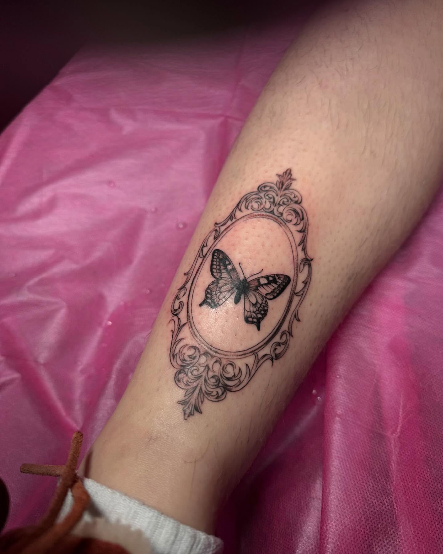 Butterfly black and grey tattoo on the forearm by Gabby Finearts