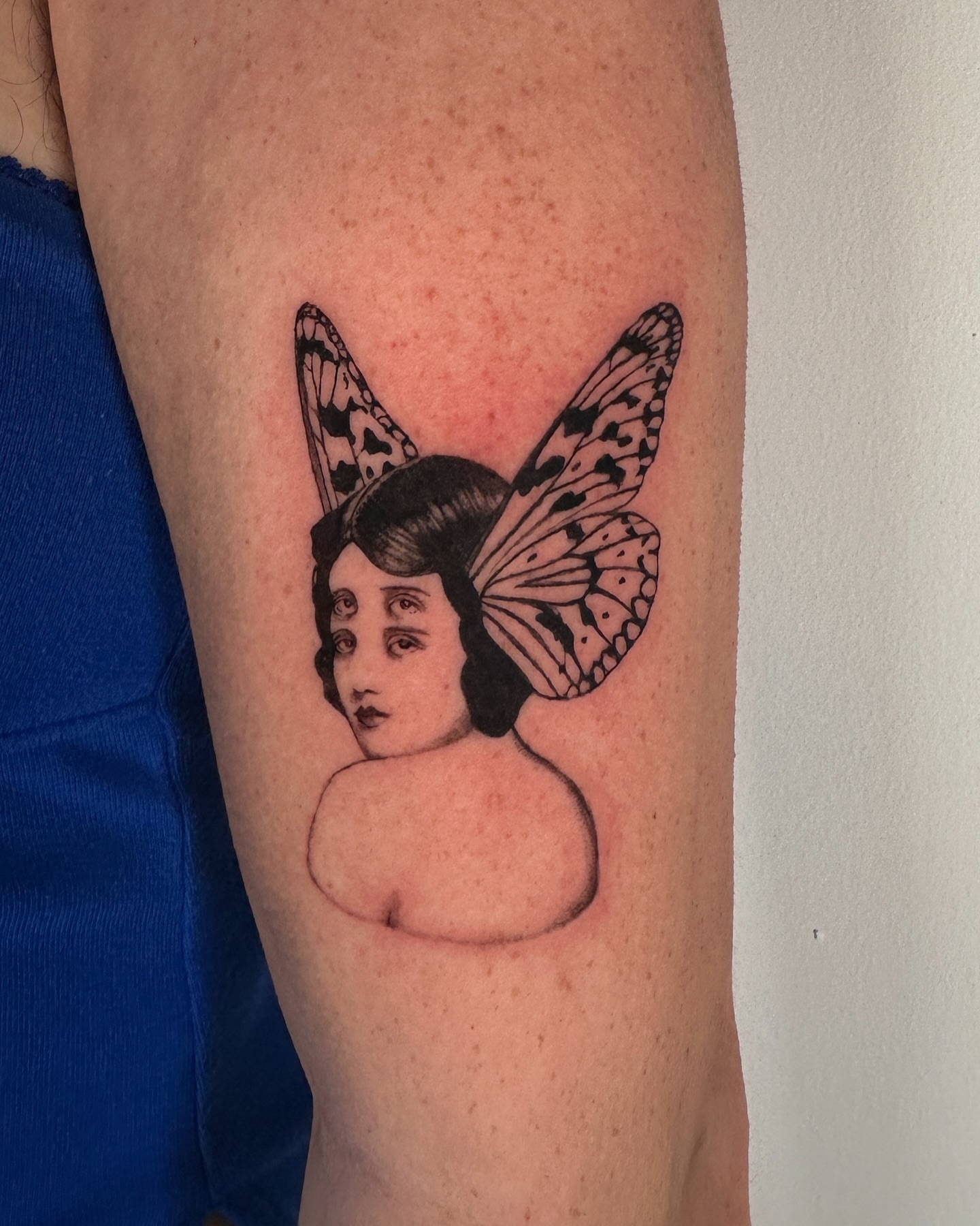 Fairy black and grey tattoo on the forearm by Hayley Jude