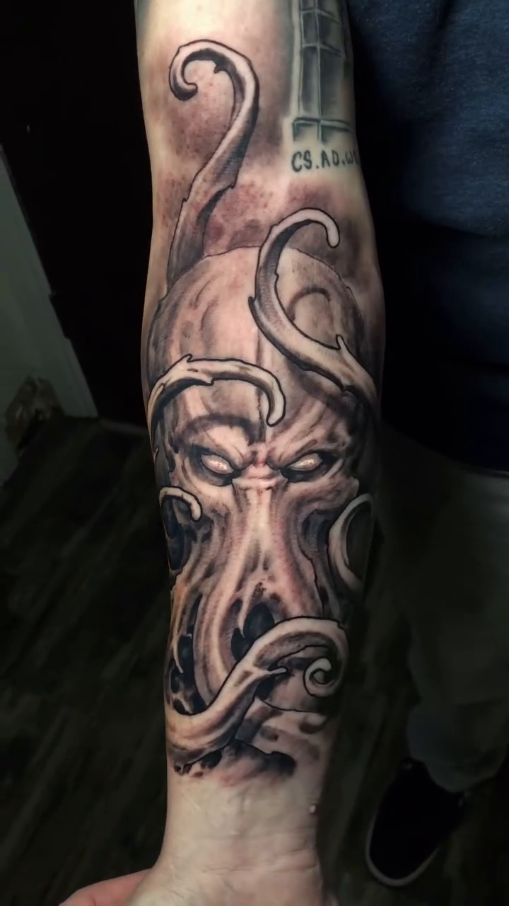 Octopus face realism tattoo by Oak Adams