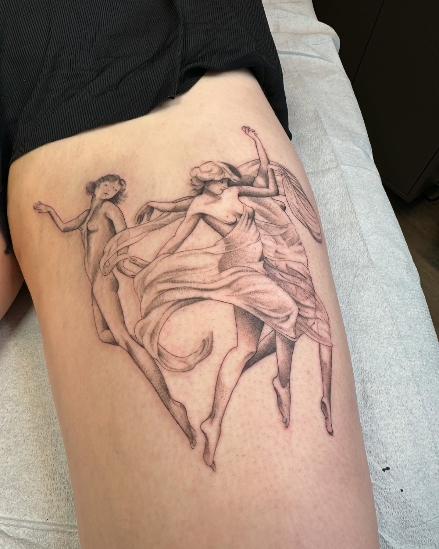 Nude figures realism tattoo on the thigh by Alyssa . Villela