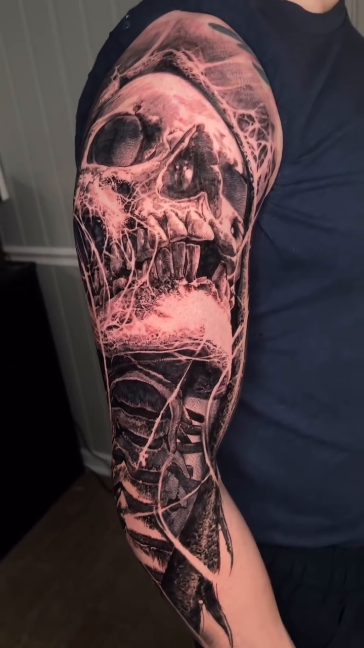 Tattoo by @robbylatos — dark_realism, black_and_grey