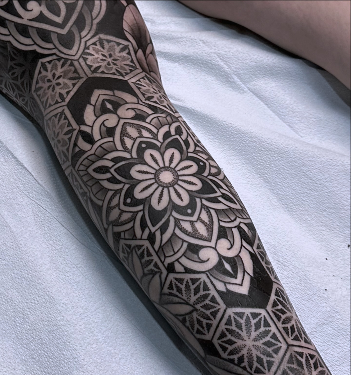 Geometric mandala geometric tattoo on the forearm by Ryan Spencer - San Diego Tattoo Artist