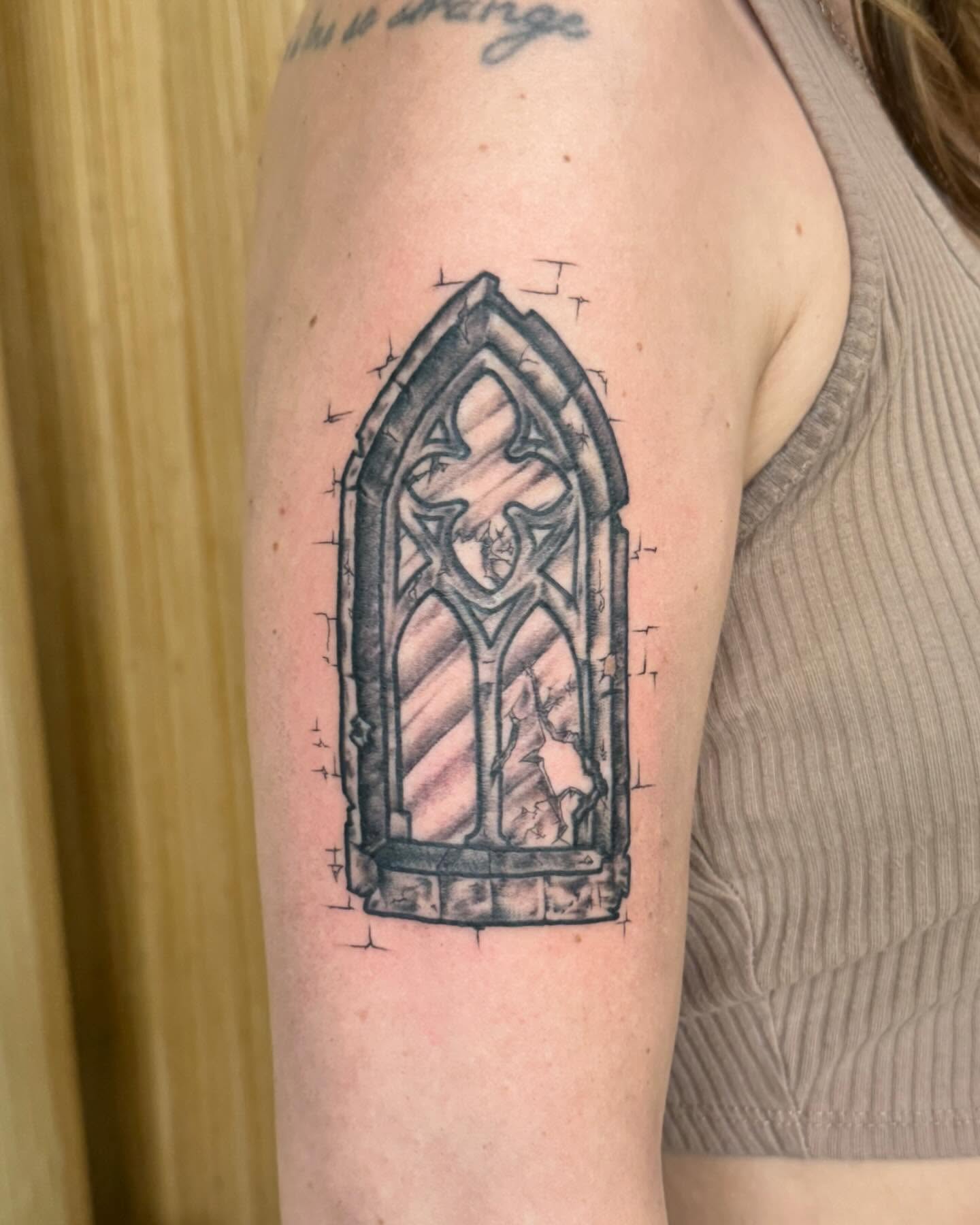 Gothic window black and grey tattoo on the forearm by G. Clover ⚧︎, Chicago, Illinois