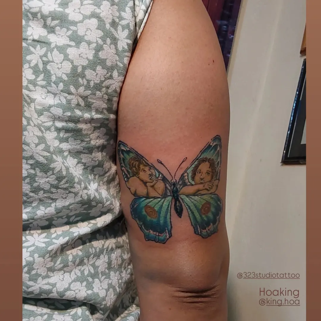 Angels and butterfly realism tattoo on the forearm by Hoa King