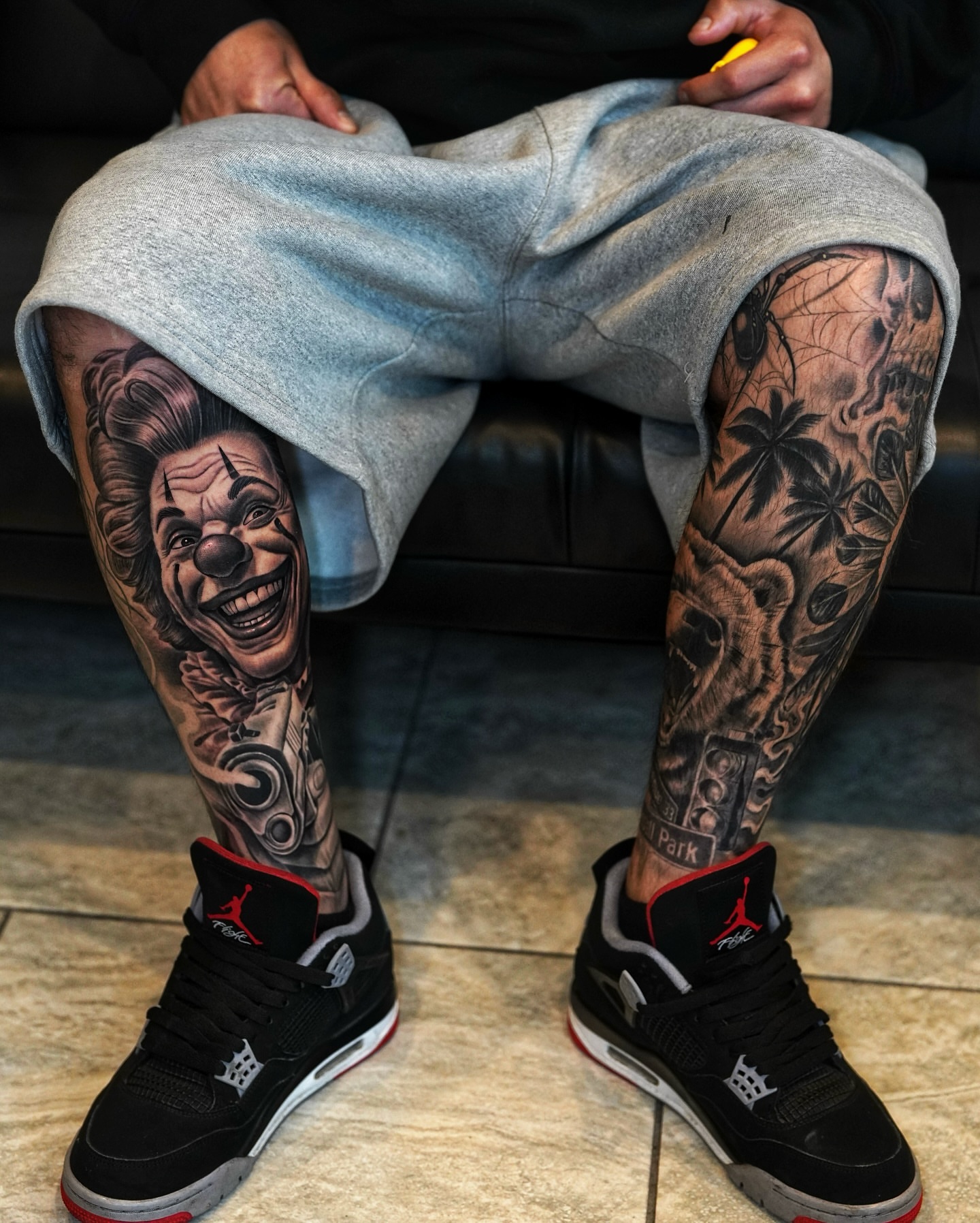 Clown face realism tattoo on the leg by Luis Peña