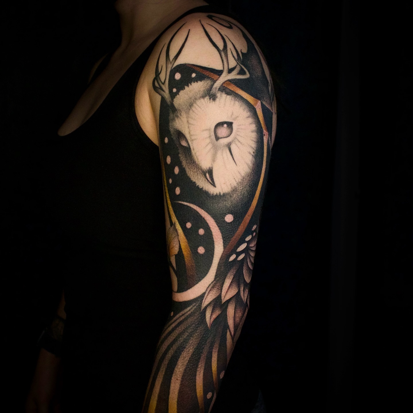 Owl realism tattoo on the upper arm by Galen