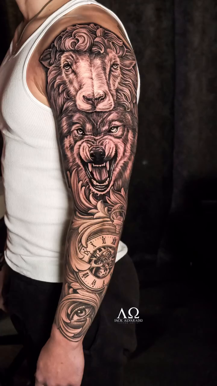 Wolf and sheep heads realism tattoo by Jack Alvarado.
