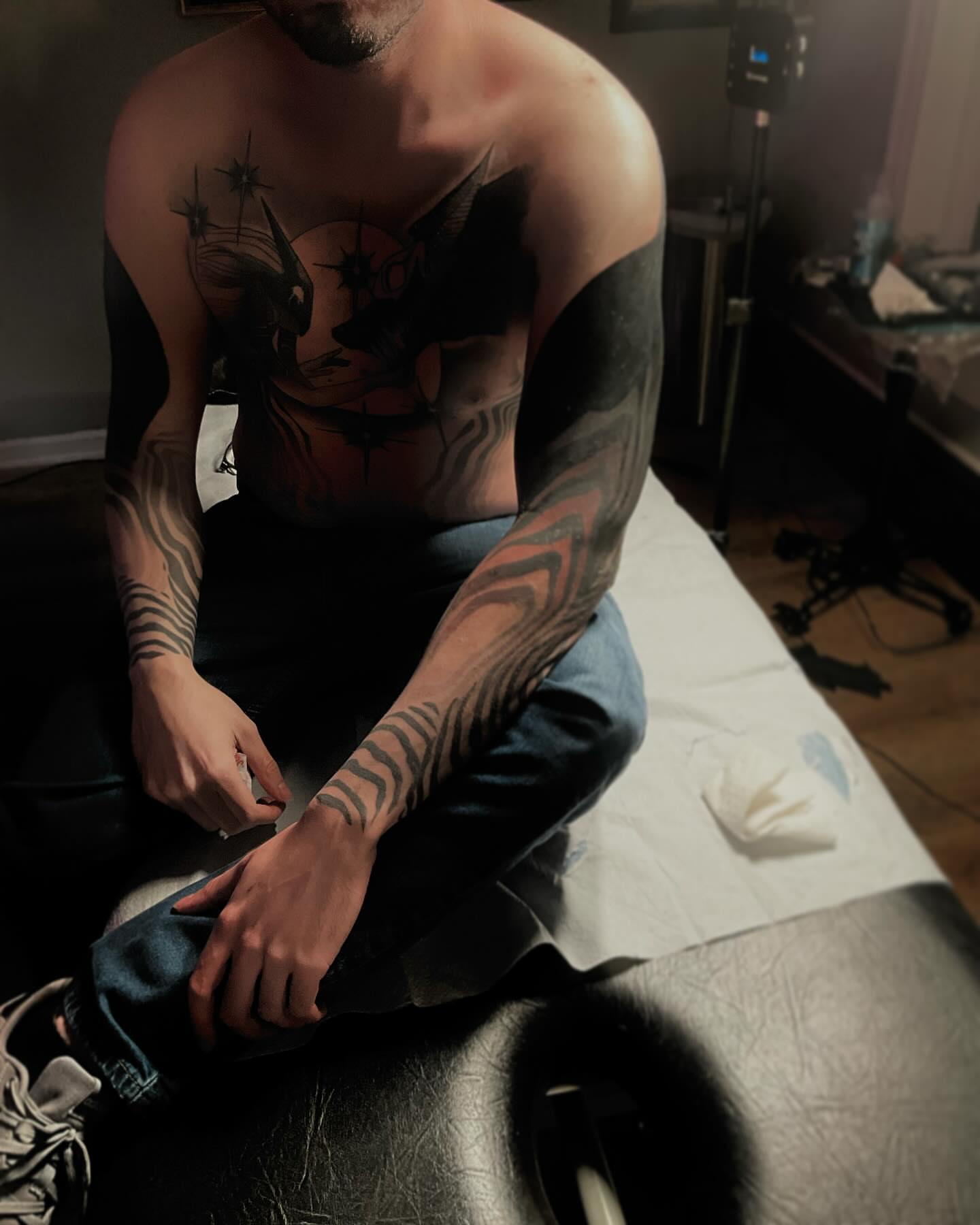 Abstract design black and grey tattoo on the chest by Rizzie D'Alterio