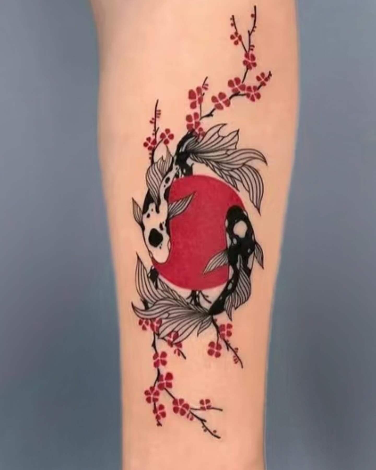 Koi fish and cherry blossoms japanese irezumi tattoo on the forearm by mia's tattoo, Los Angeles, California
