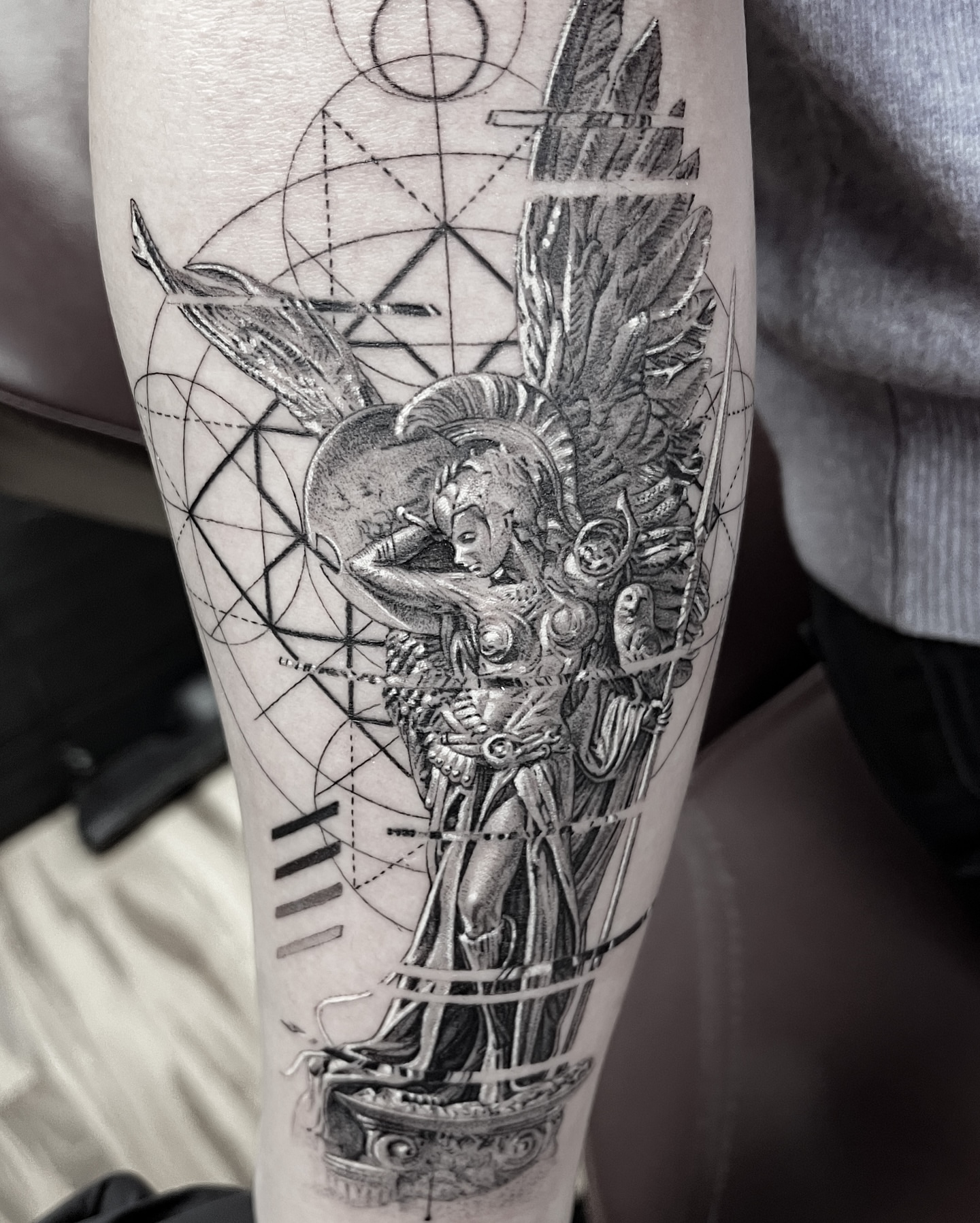 Warrior angel realism tattoo on the forearm by Dan Sprague