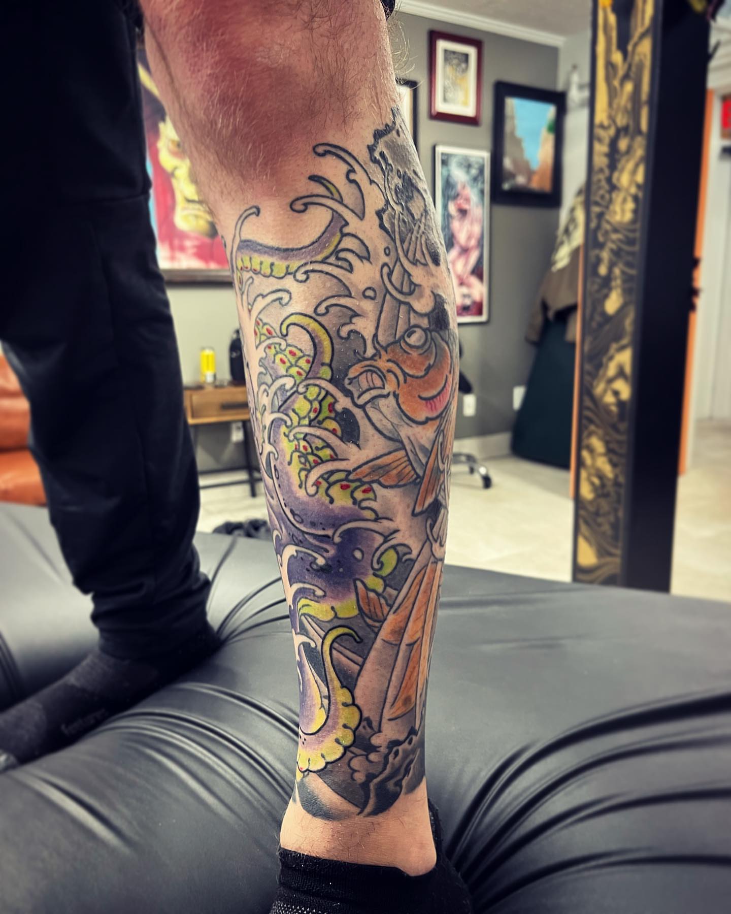 Mermaid and octopus American traditional tattoo on the calf by biggstattoos