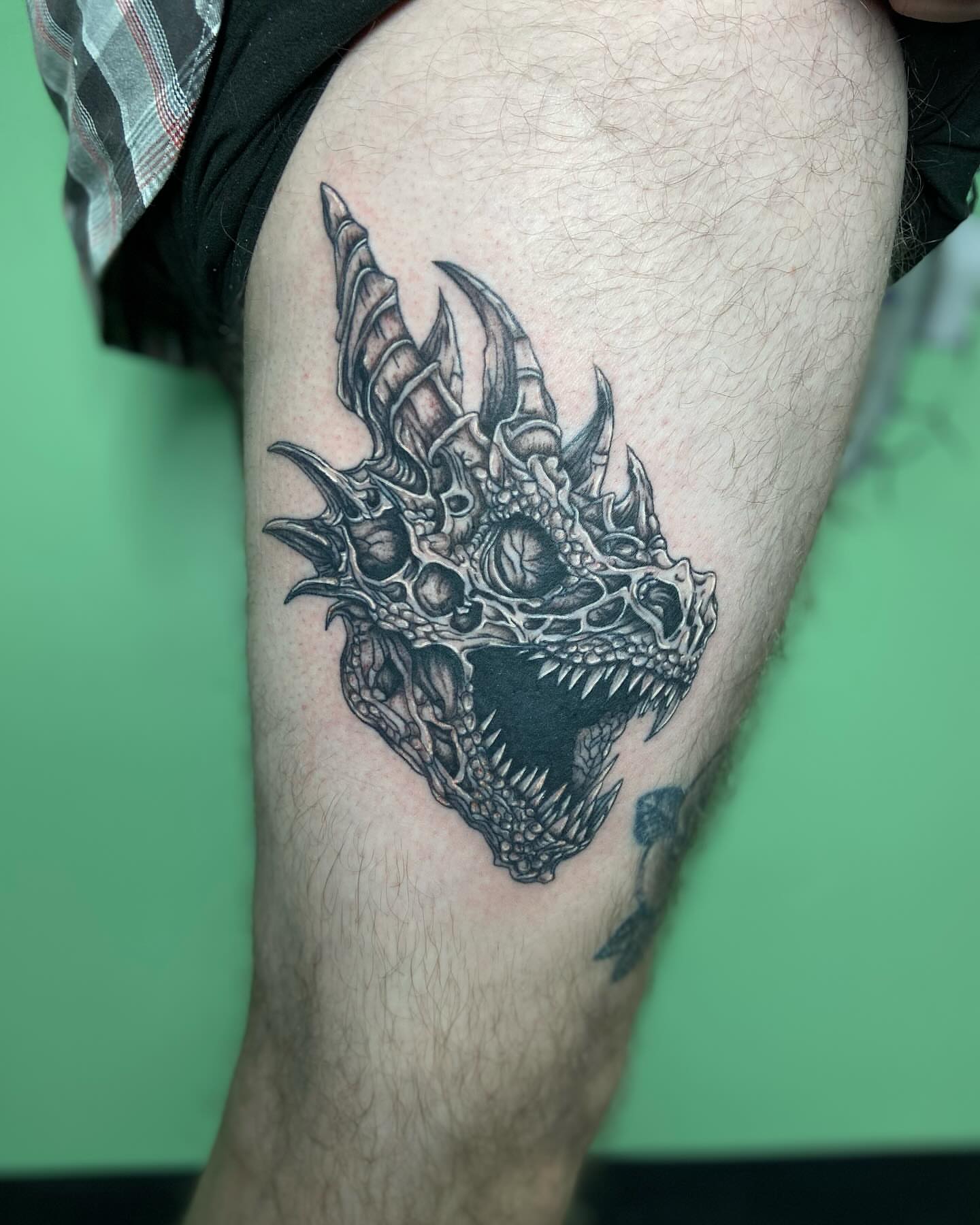 Dragon skull realism tattoo on the thigh by ✶ teryn ✶, Akron, Ohio