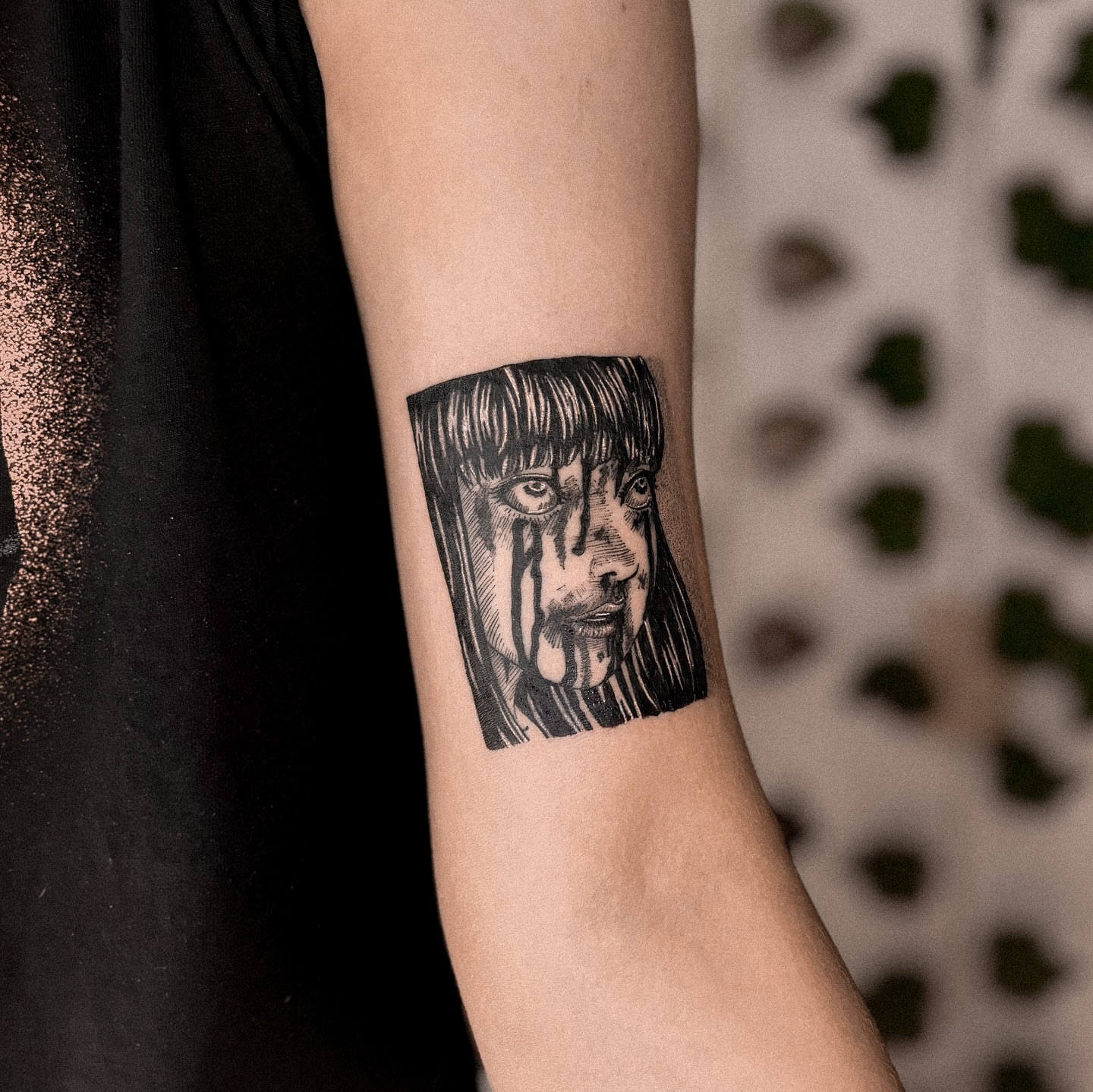 Portrait black and grey tattoo on the forearm by 조조