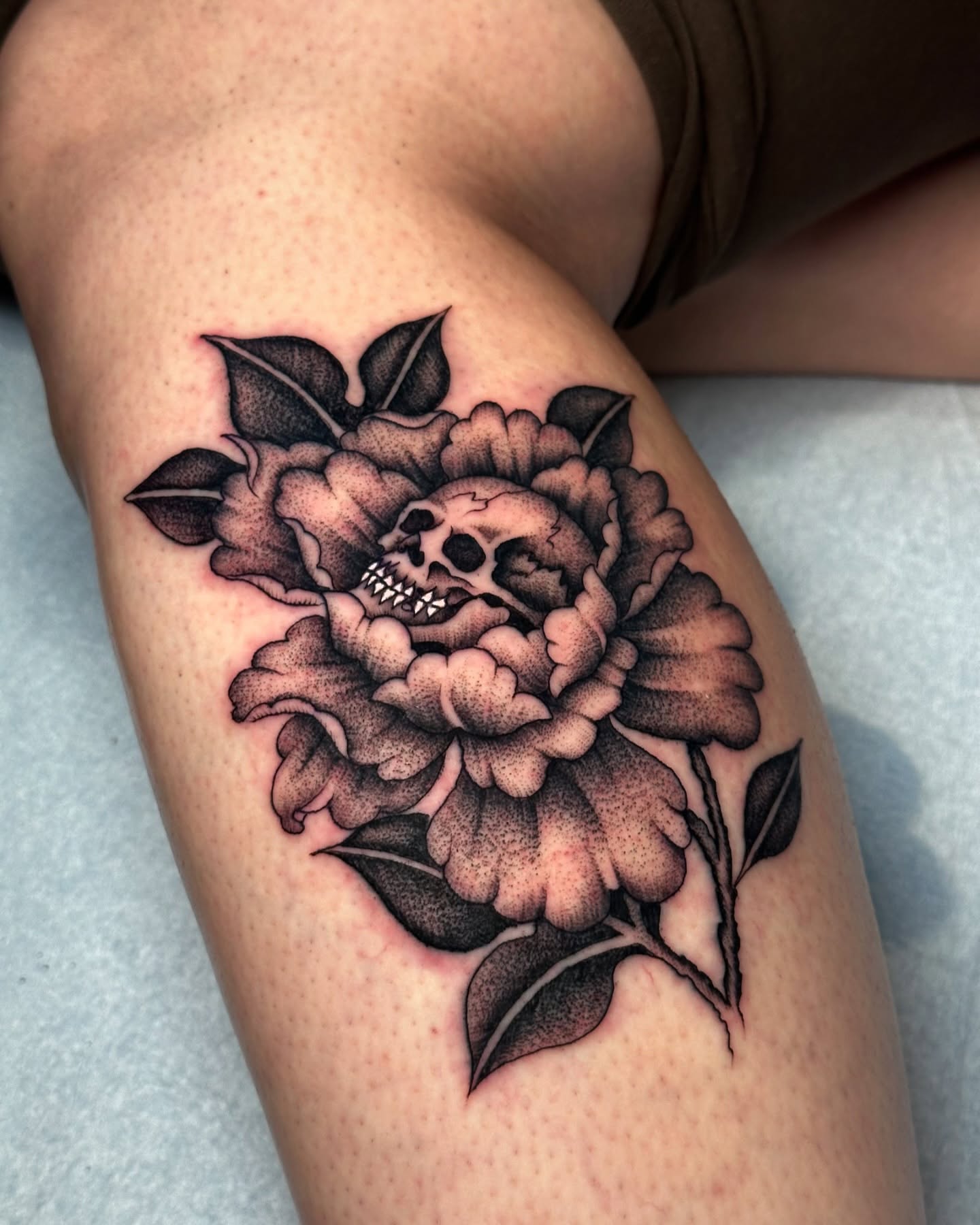 Peony with skull American traditional tattoo on the forearm by Matthew, Georgetown, Texas