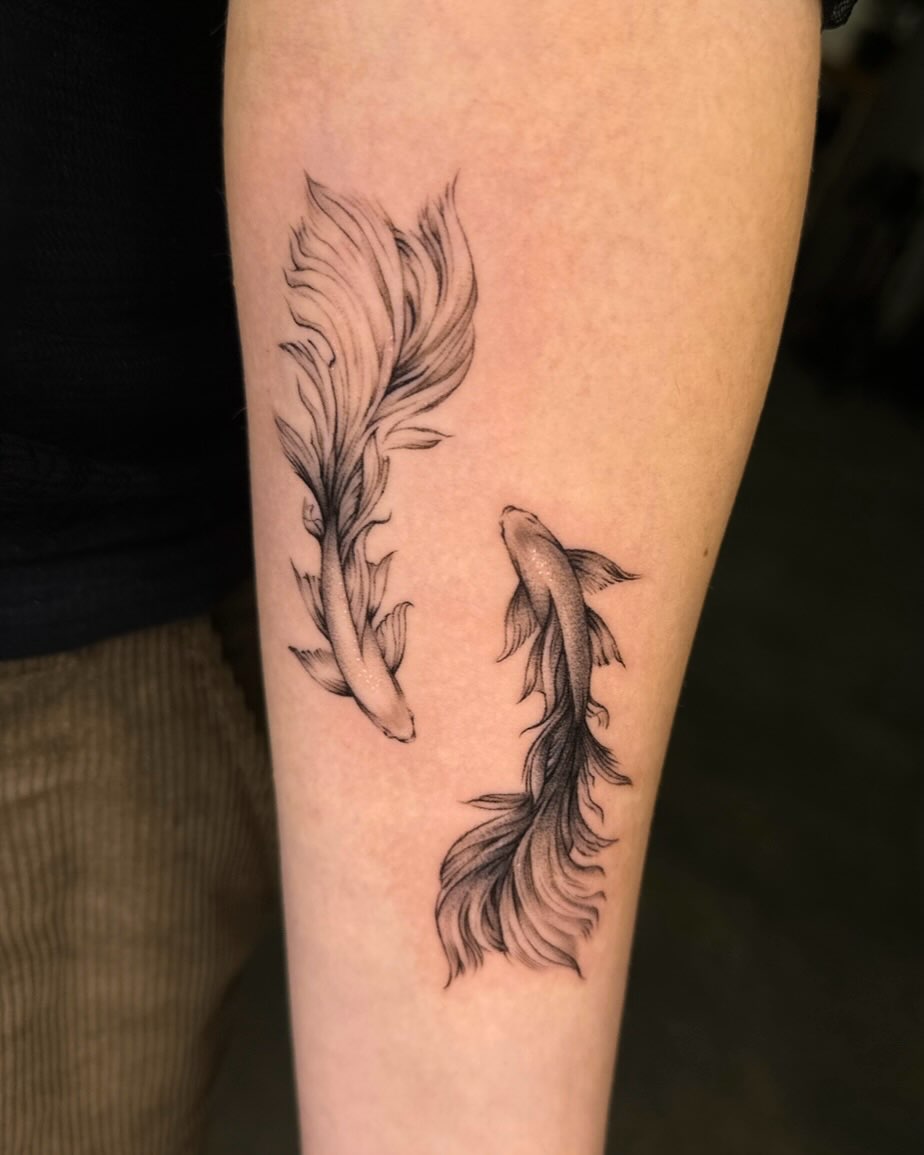 Koi fish black and grey tattoo on the forearm by Tattoo artist EJ (Mireu)
