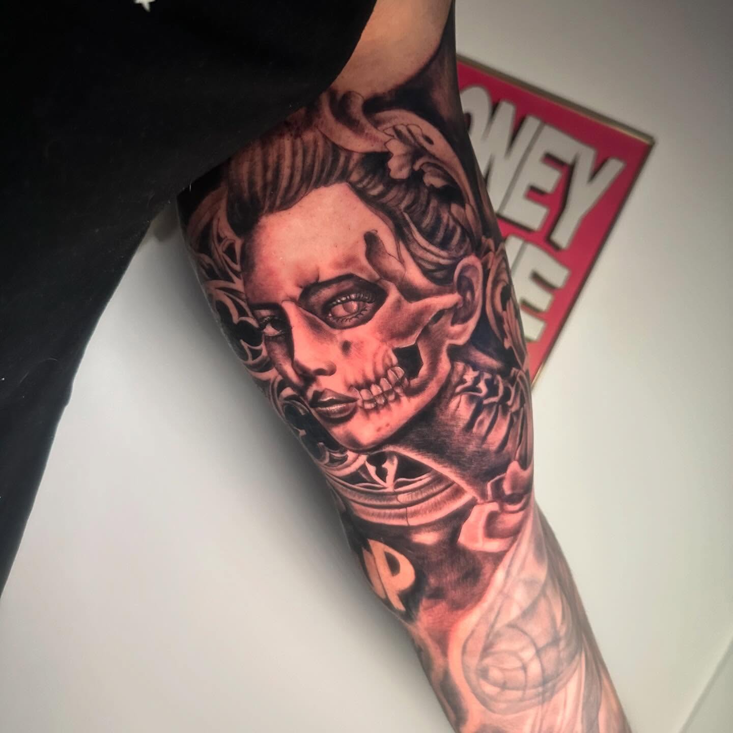 Woman's face realism tattoo on the forearm by Anghel Patricia
