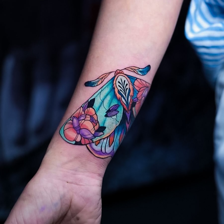 Butterfly new school tattoo on the forearm by Katherin Plaza