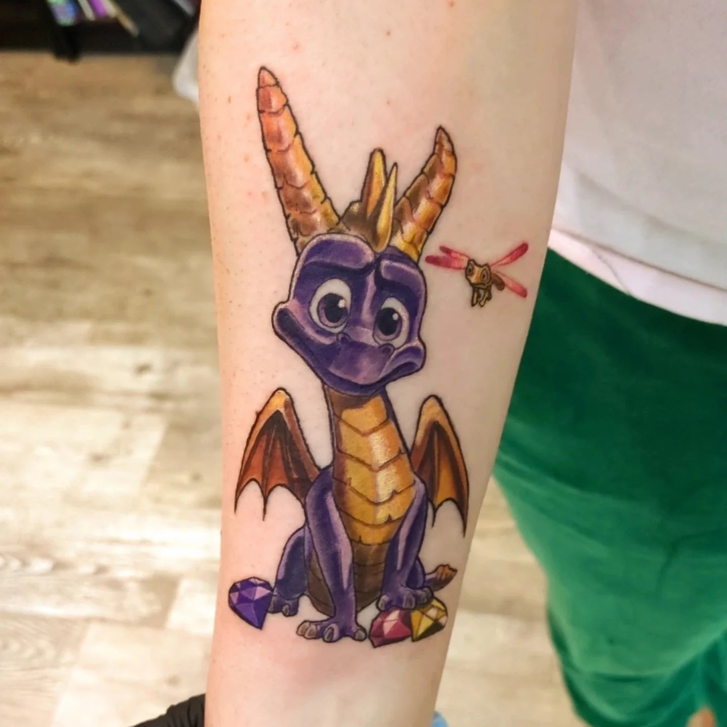 Spyro the Dragon illustrative tattoo on the forearm by Lahel (Lay-el) Fowler