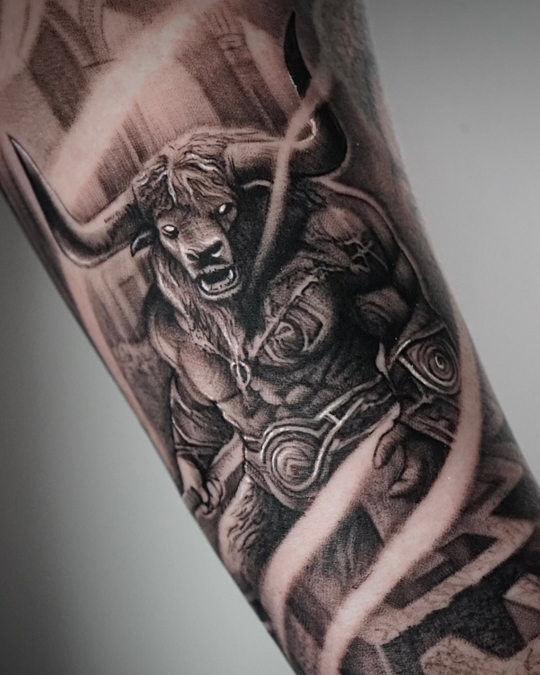 Bull and warrior realism tattoo on the forearm by Sabrina Lakhaysy, Fort Worth, Texas
