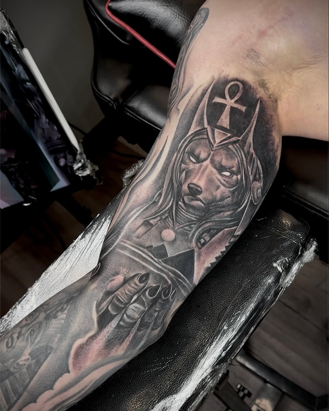 Dog with crown realism tattoo on the forearm by Tatt2T (T King)