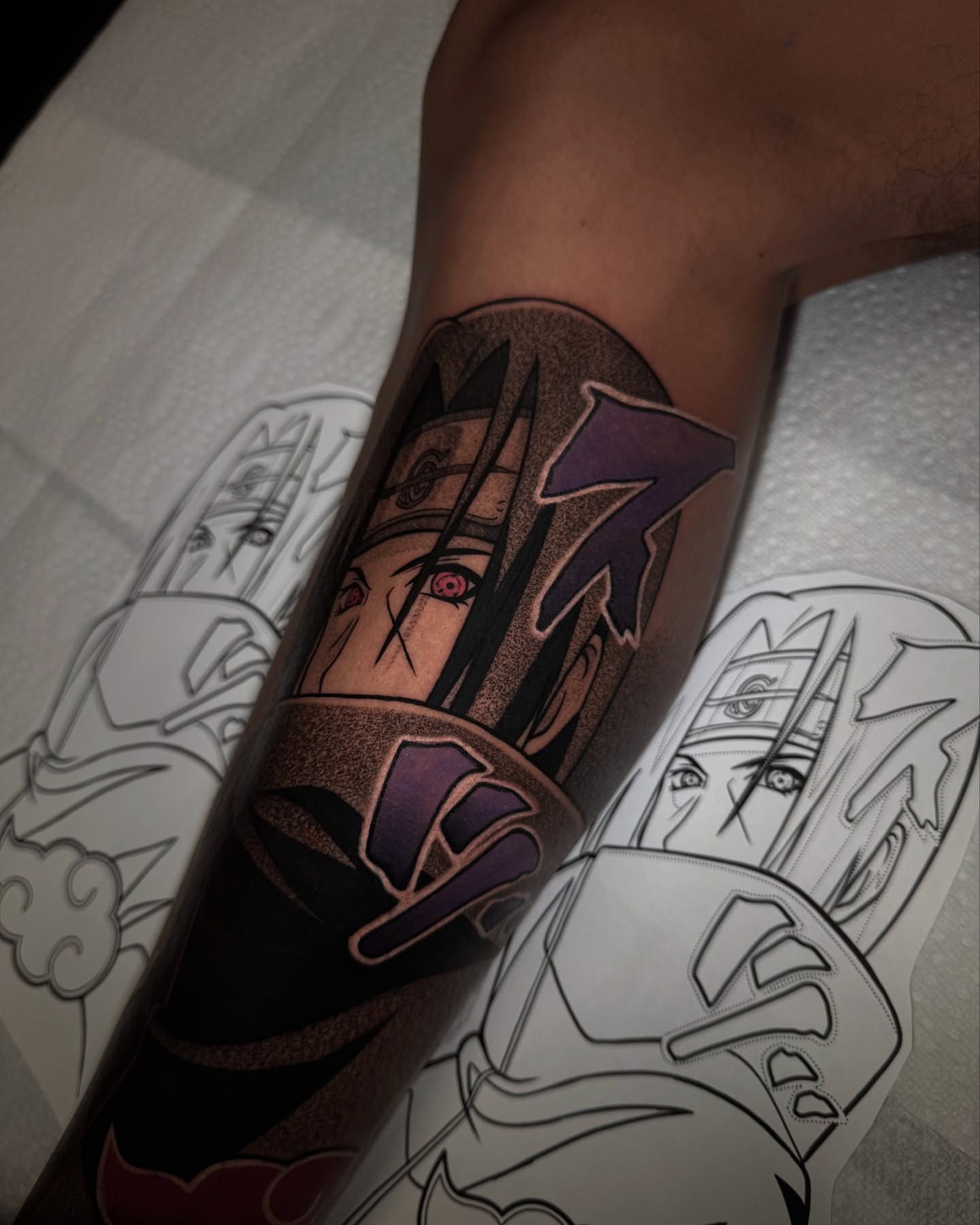 Naruto anime tattoo on the forearm by Anthony D. Rustik