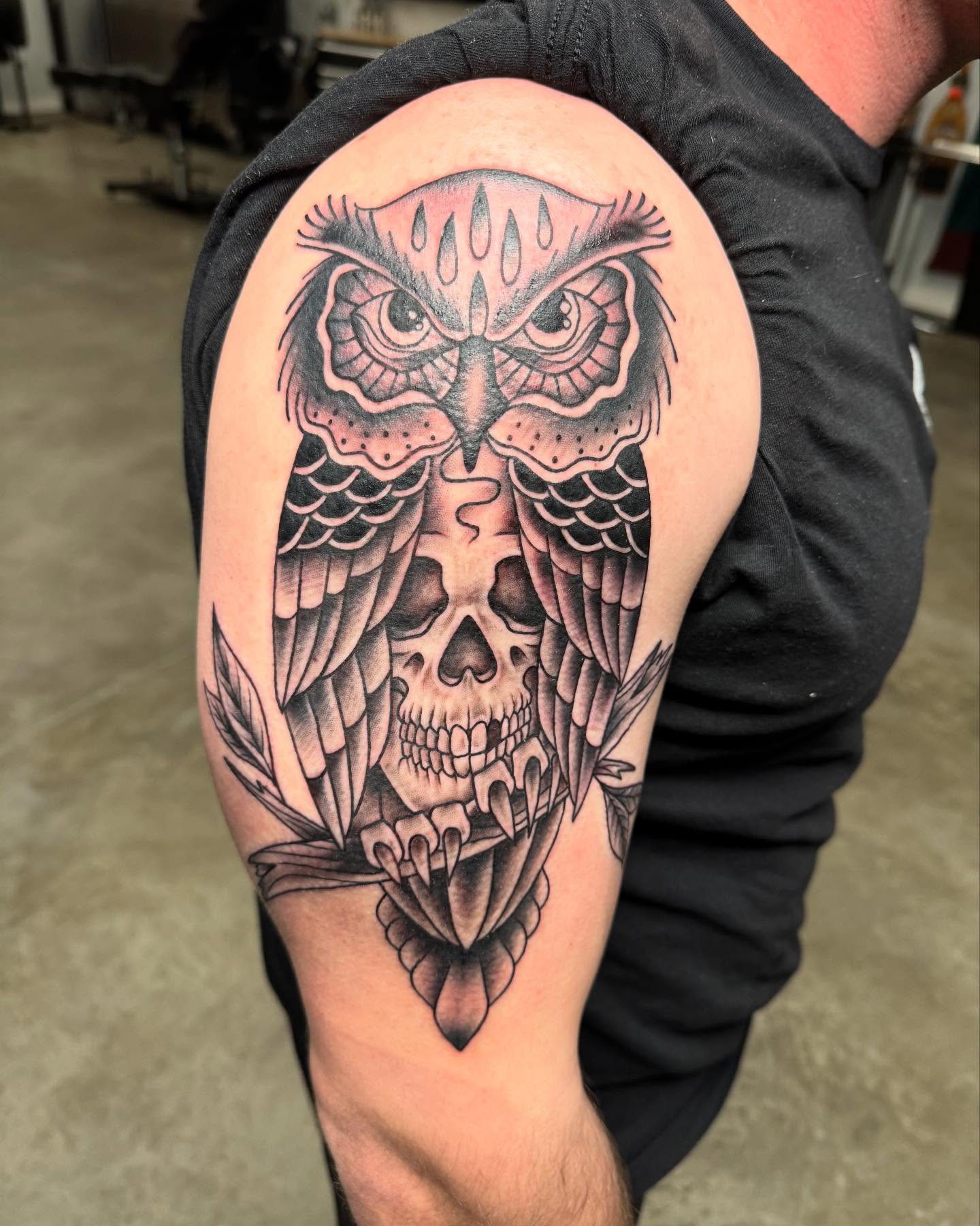 Owl and skull American traditional tattoo on the shoulder by Cory Perry-Servellon