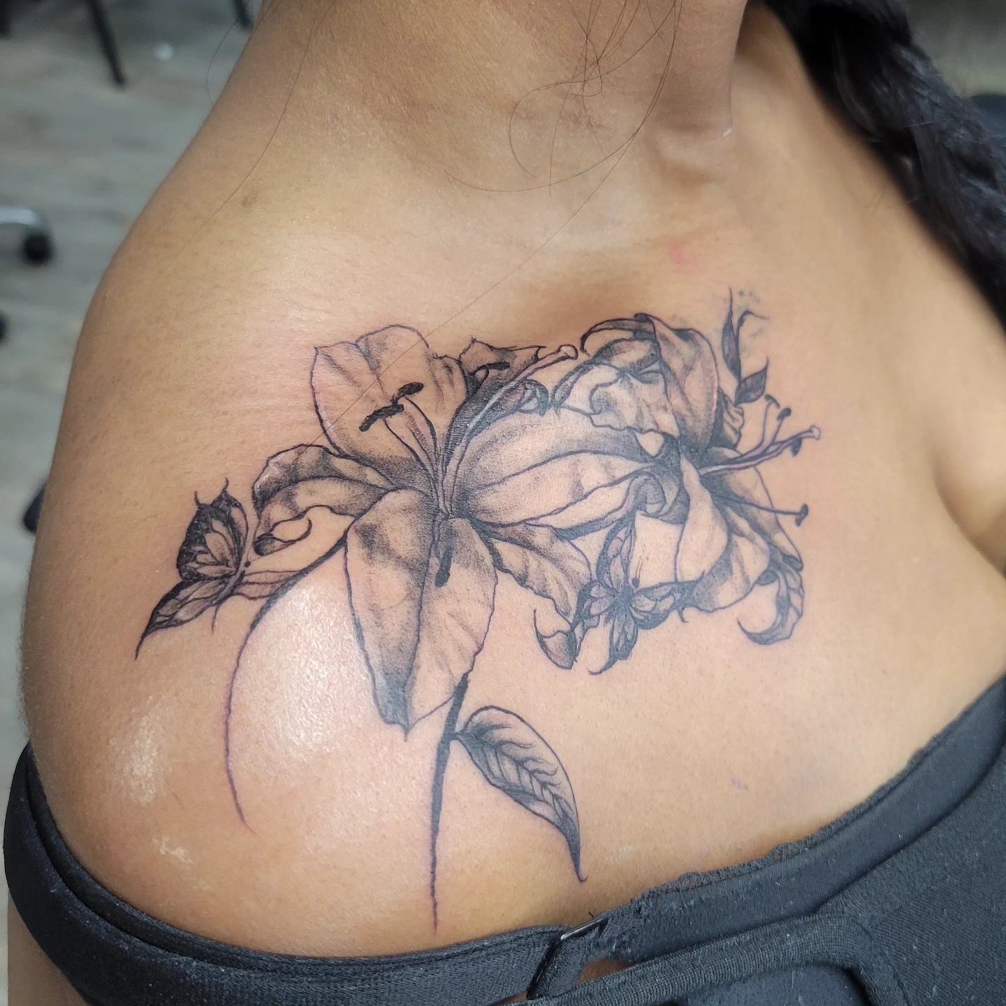 Lily realism tattoo on the shoulder by LolaCat🐉
