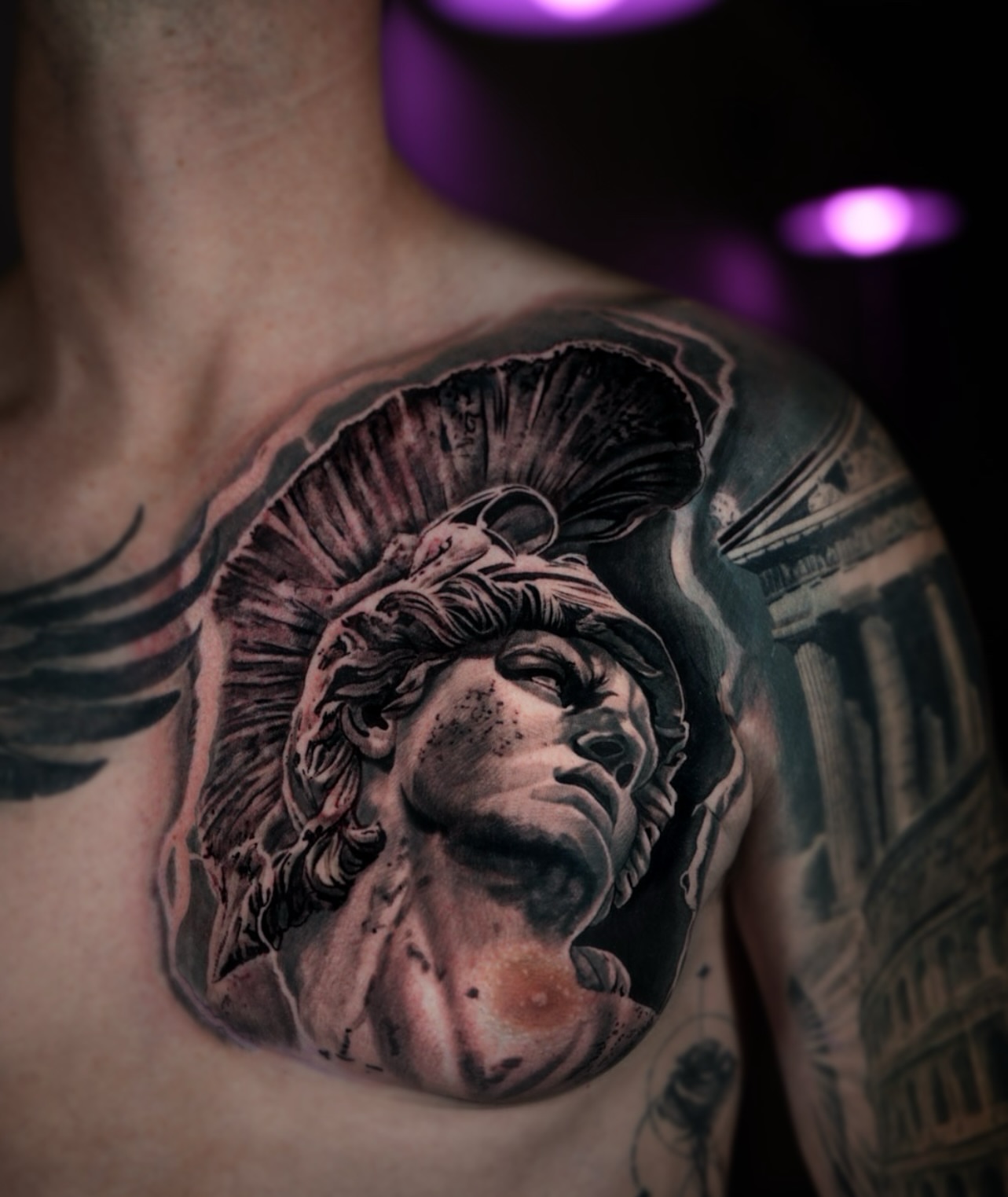 Statue head realism tattoo on the chest by Bailey Lemus