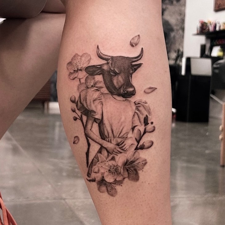 Bull and child realism tattoo on the thigh by Longtea