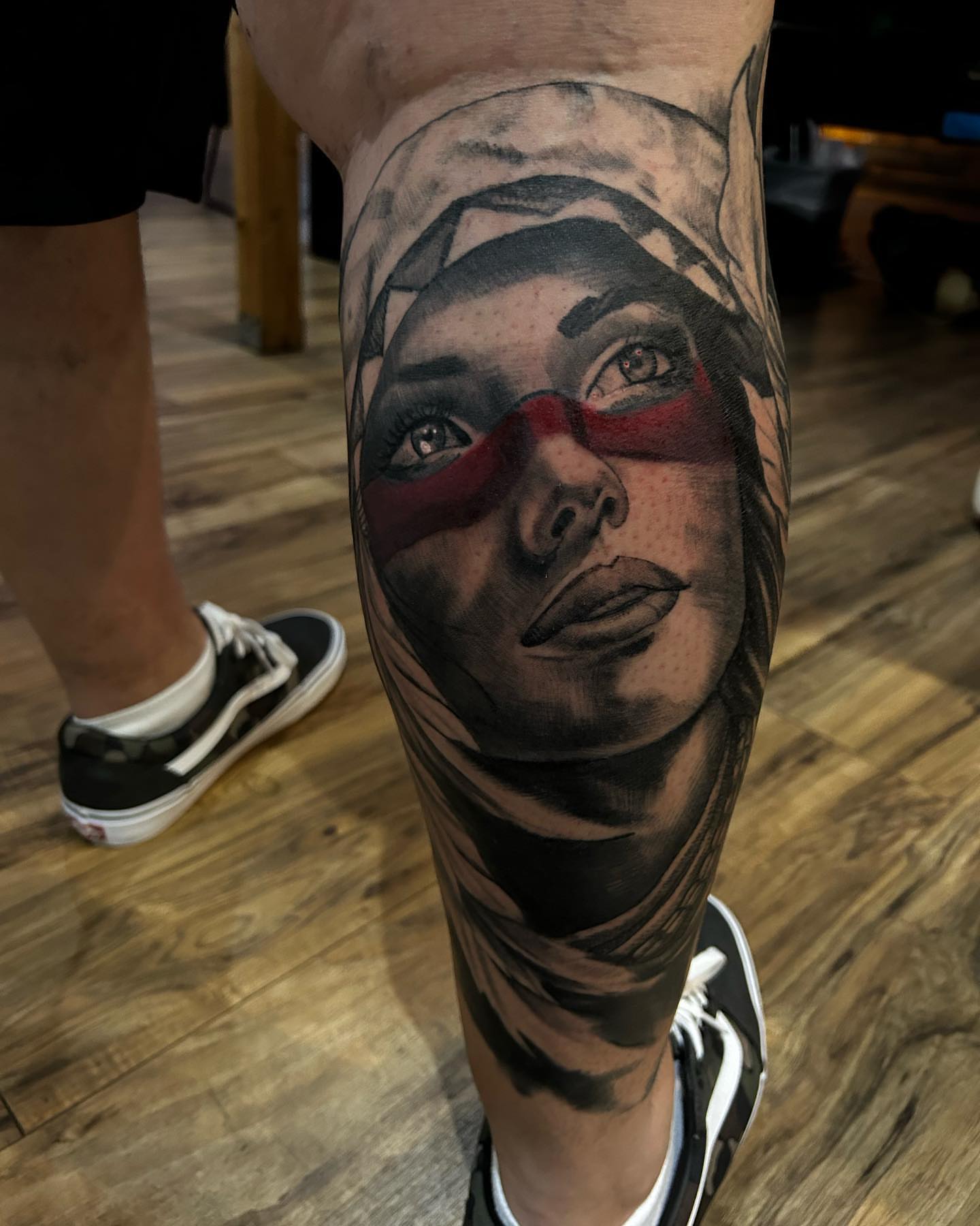Woman's face realism tattoo on the forearm by Cody Lambert